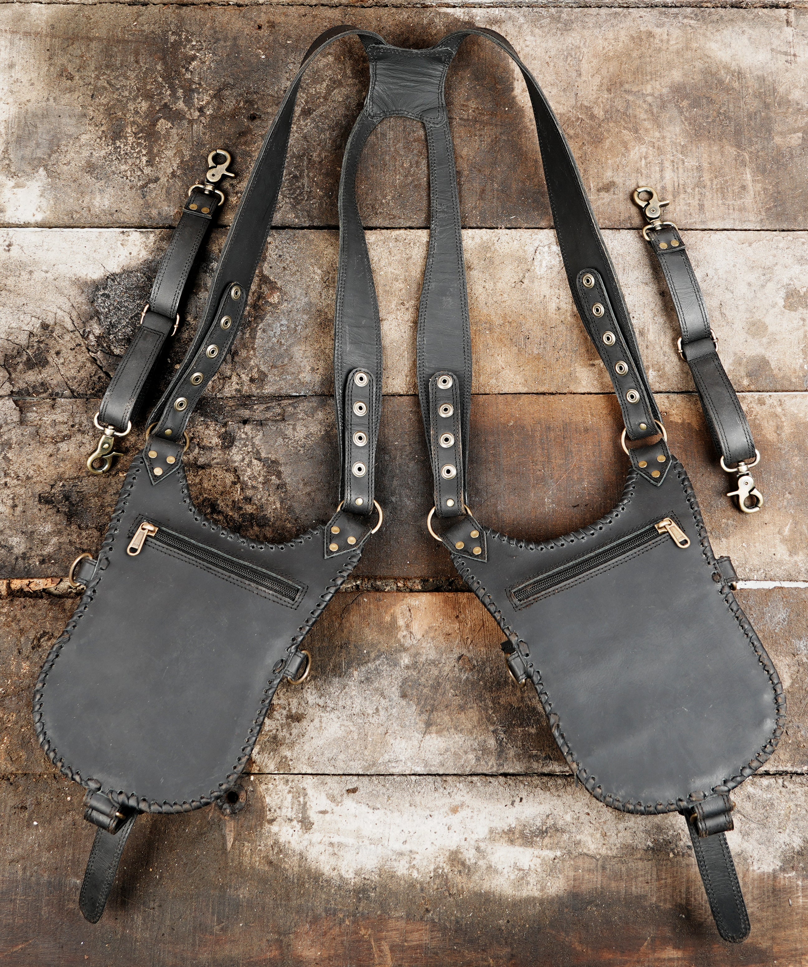 "Durable leather holster harness with artistic stitched patterns"