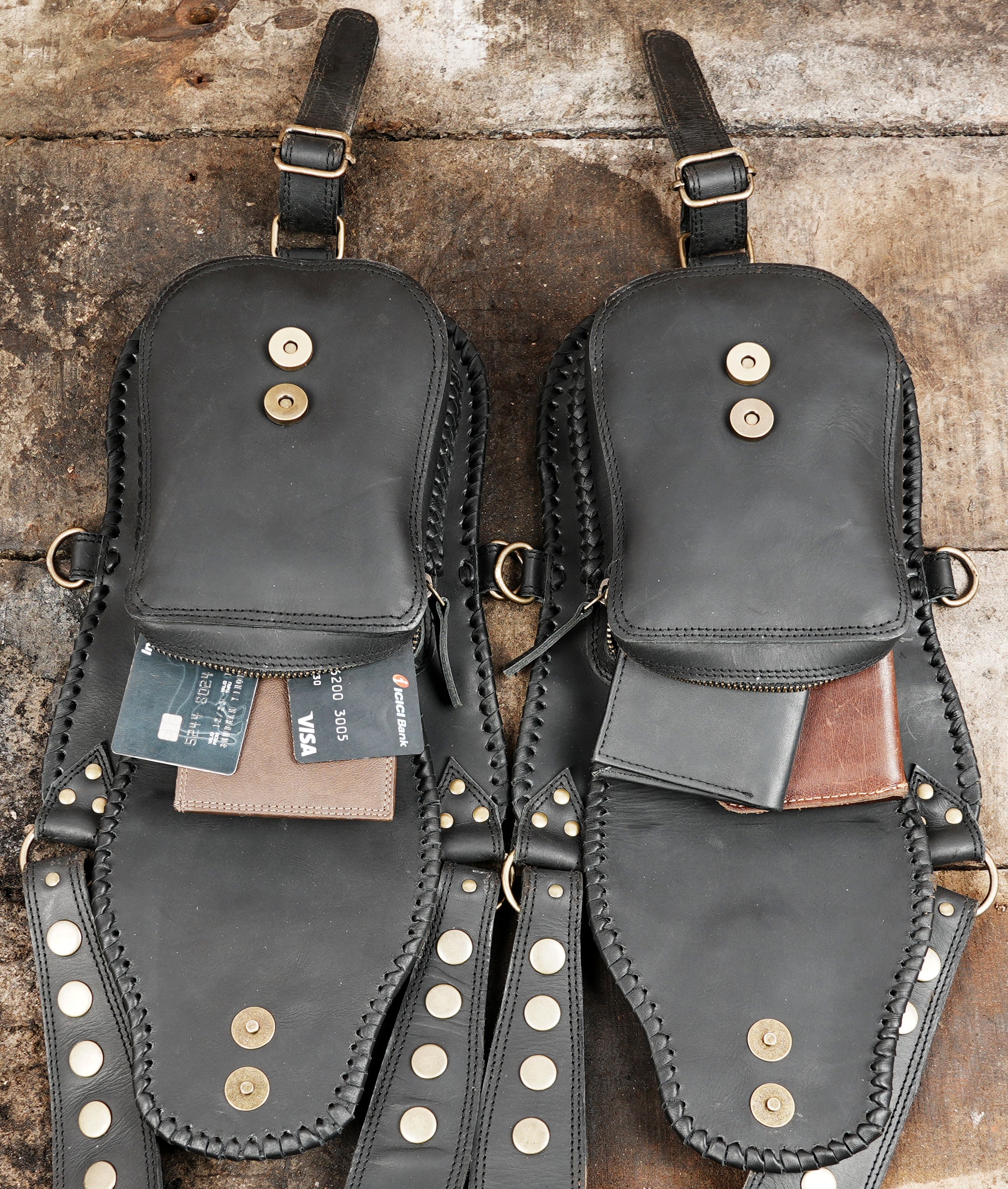 "Dual side leather holster with brass hardware details"