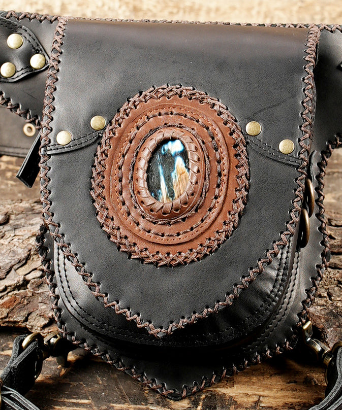 Steampunk style utility hip bag in black leather with gemstone design