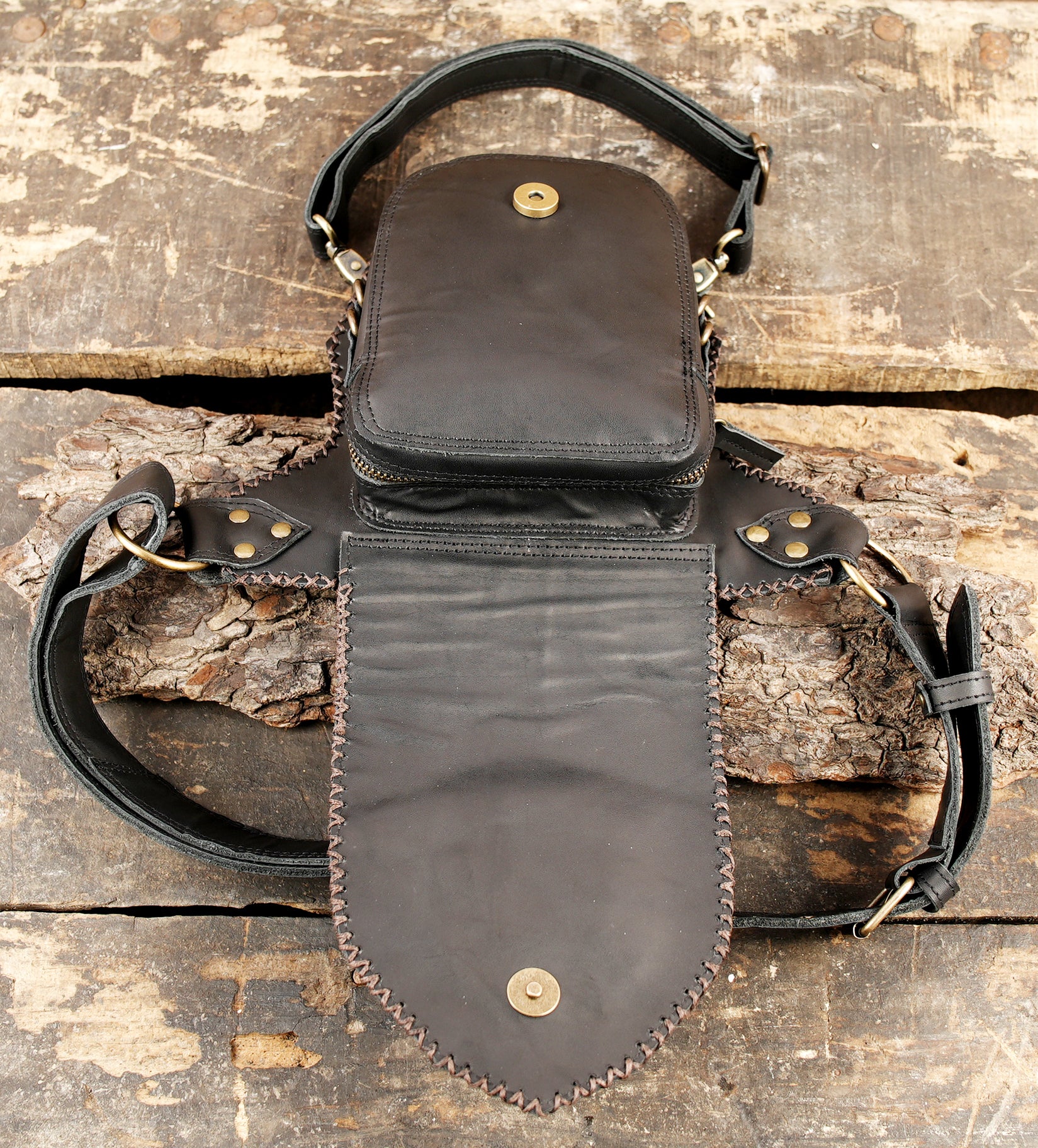 Black leather waist thigh belt with artisan craftsmanship