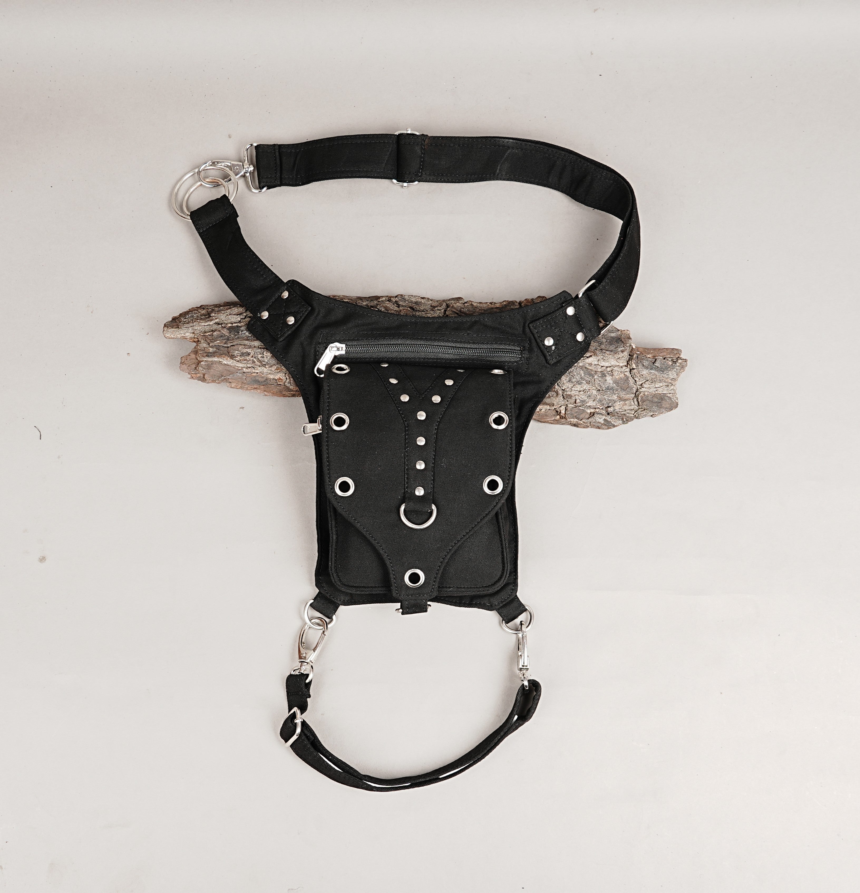 Black cotton canvas drop leg bag with metal eyelets and studs