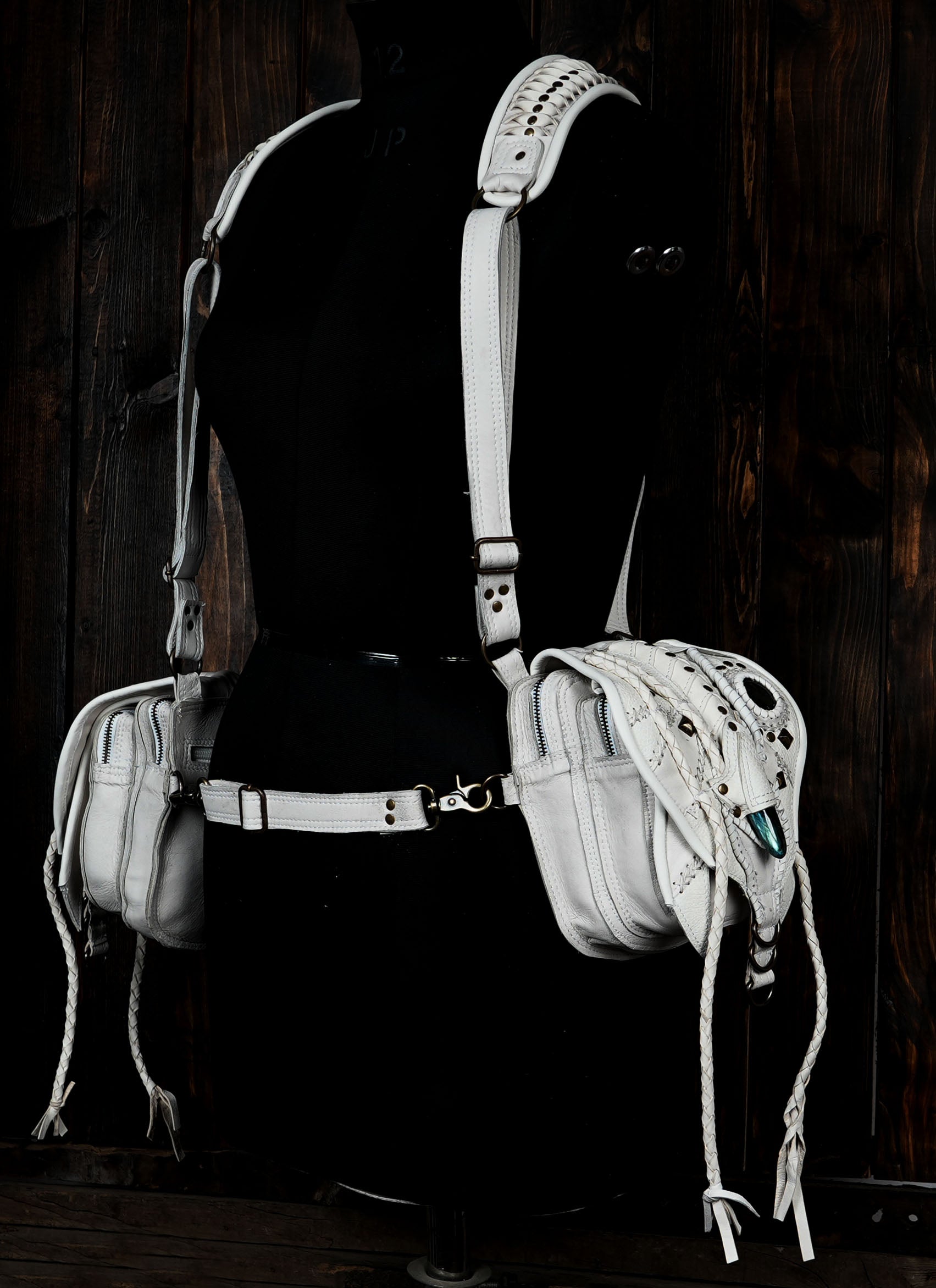 Decorative leather holster harness with adjustable brass buckles