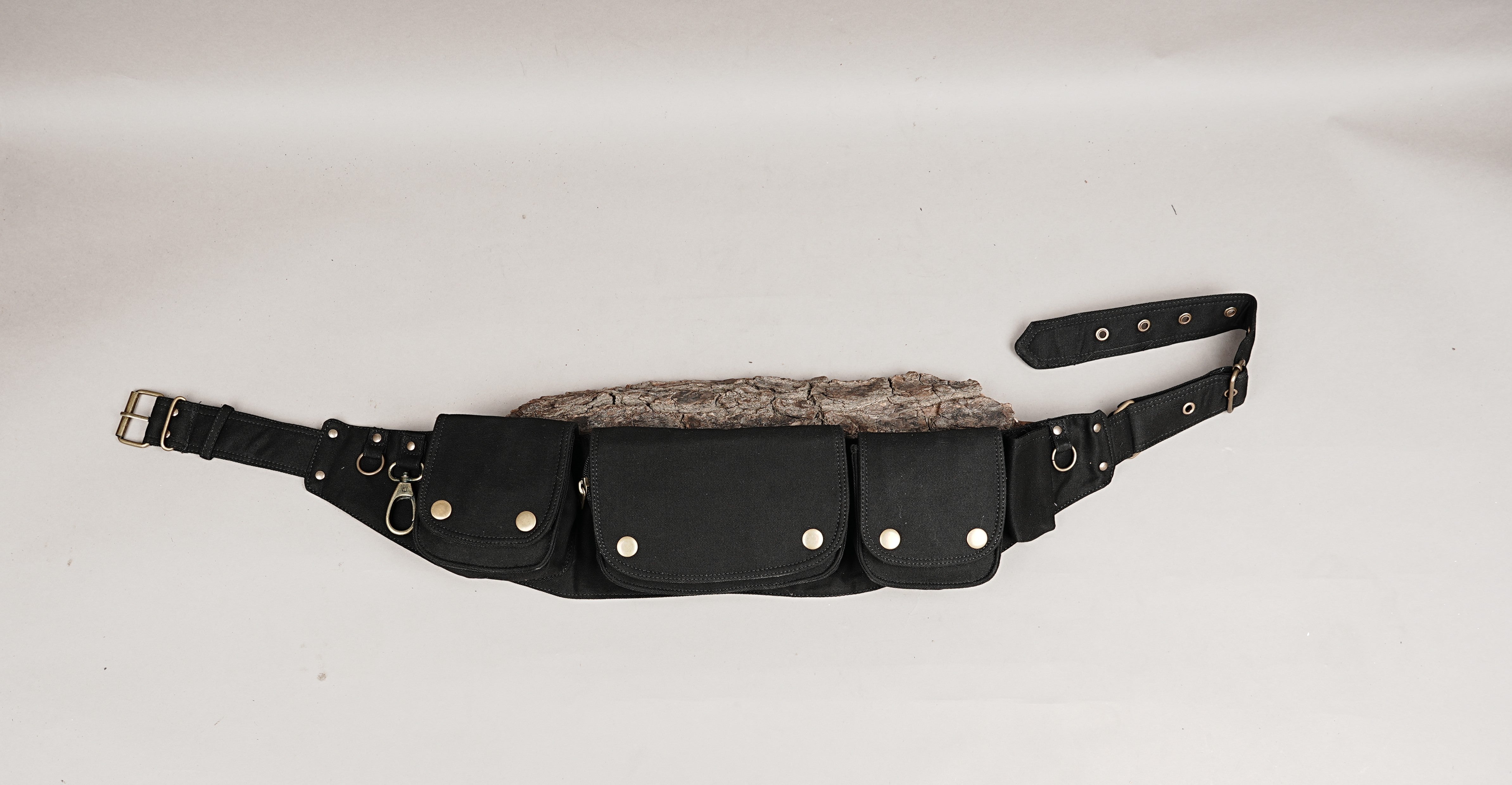 Festival-ready multi-pocket fanny pack, black fabric with sturdy construction and metal details.