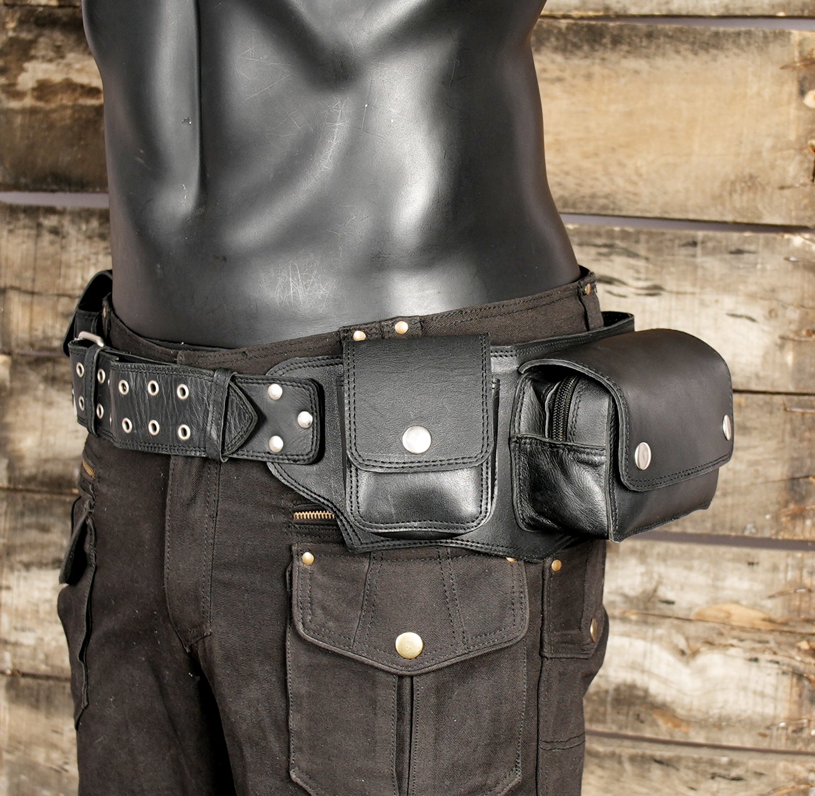 Black leather waist belt with multiple snap pockets