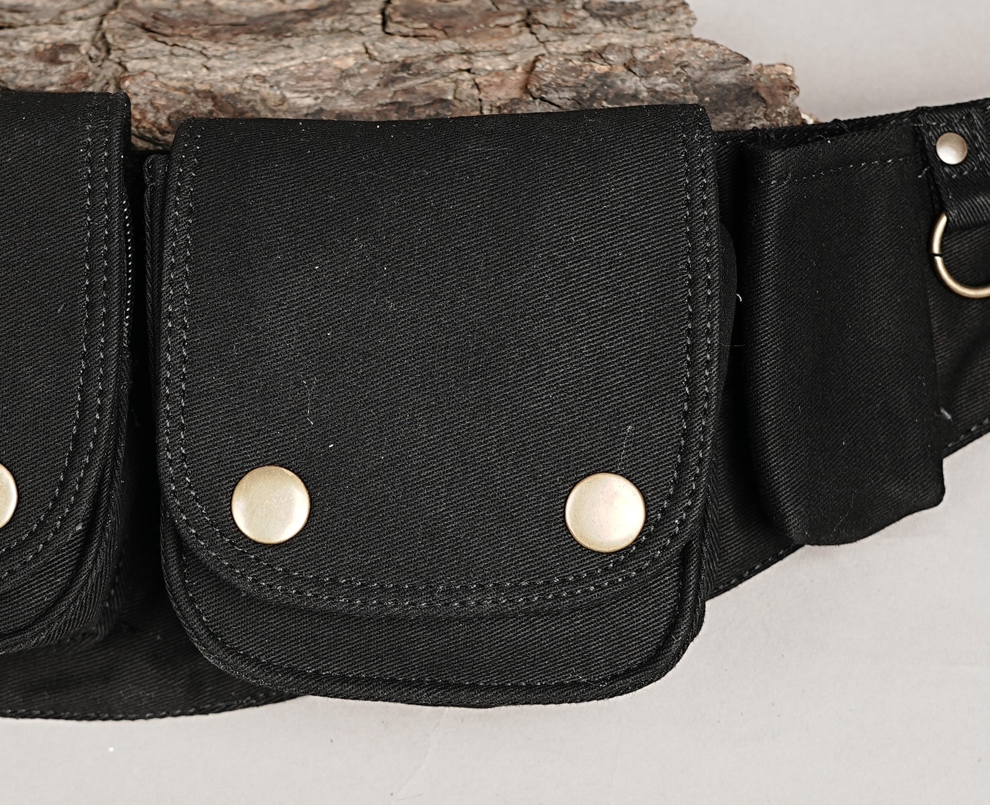 Steampunk-inspired black waist bag, multi-compartment utility belt with snap buttons and clasps.