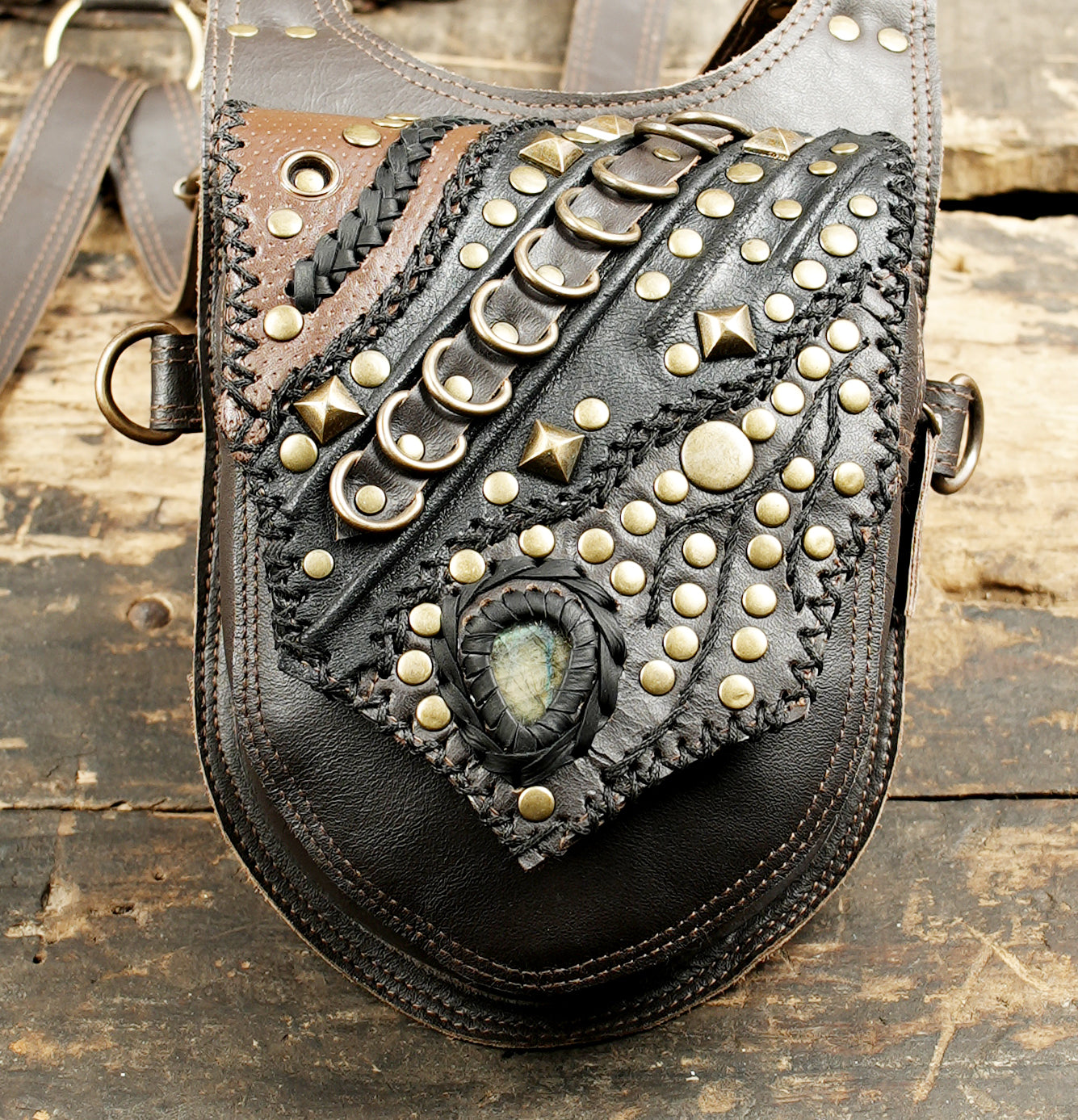 Steampunk leather holster set with ornate metal studs and tribal design