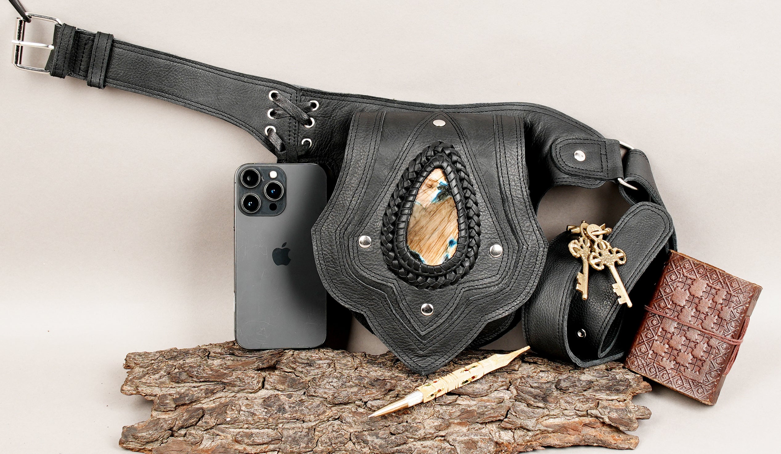Black leather utility waist belt with artisan finish