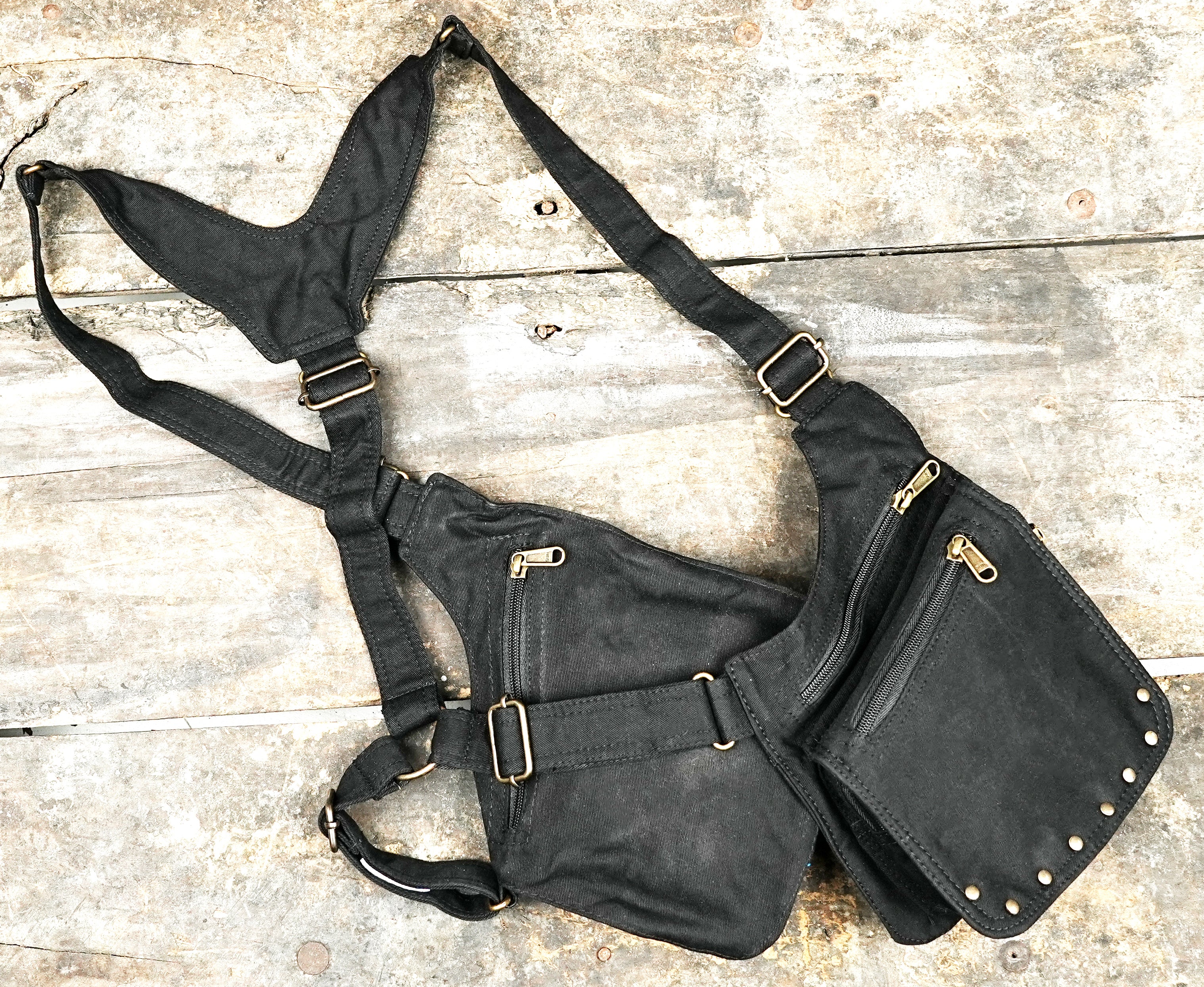 Adjustable straps chest holster with front pockets on each side