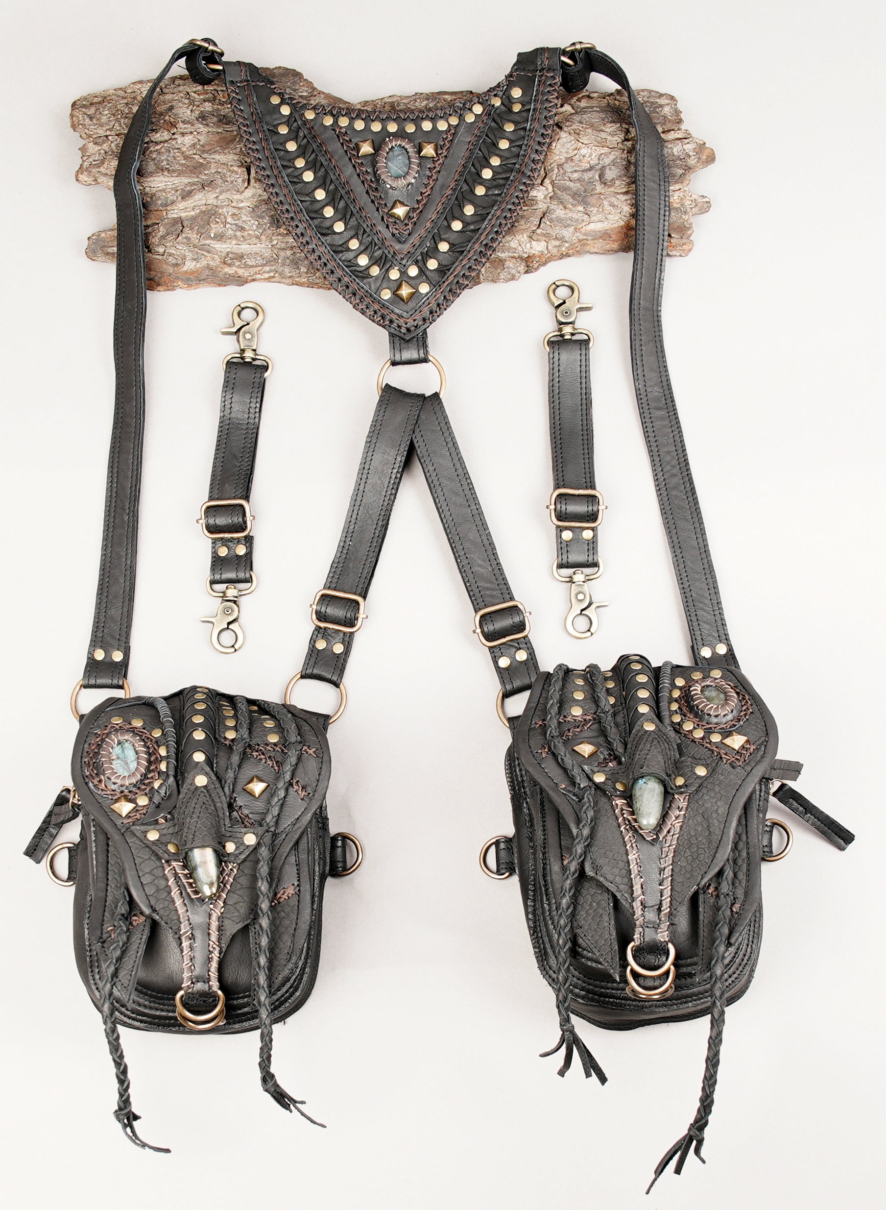 Handmade leather chest holster with dual pouches and gemstone detail