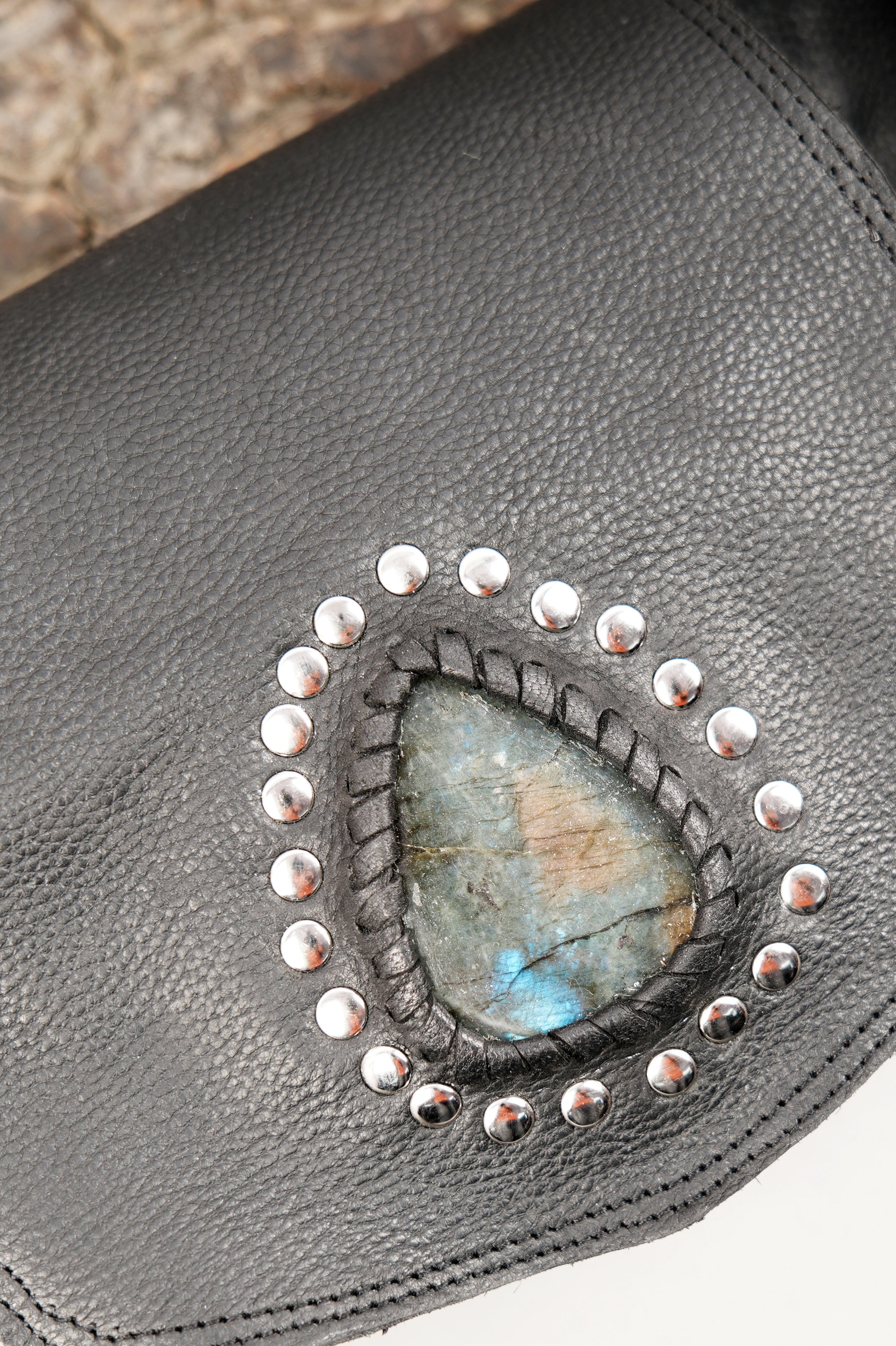 Black leather waist belt bag with artisan stone accent