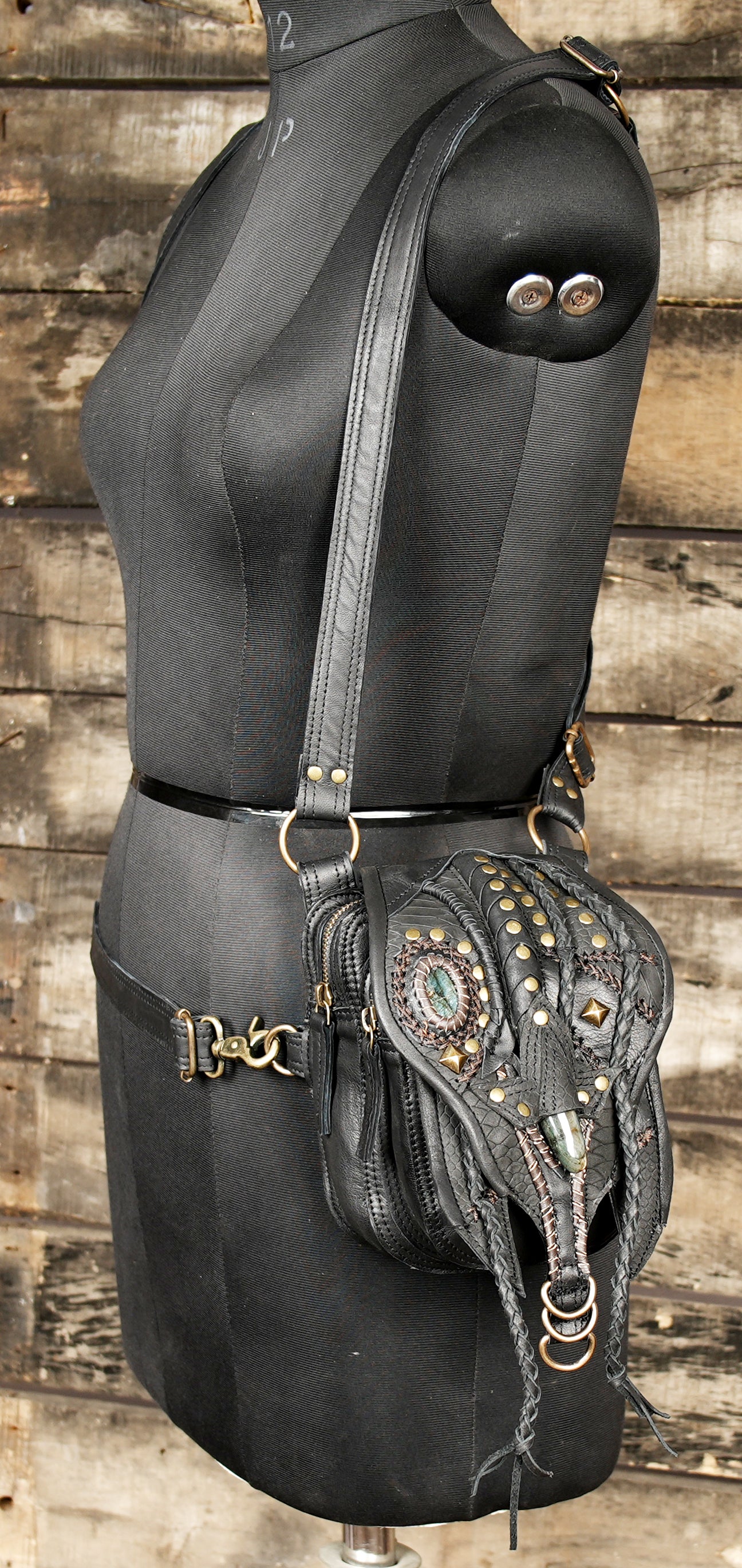 Rugged leather chest holster with secure buckle straps