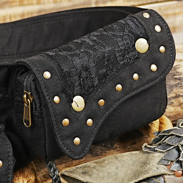 Hands-free festival utility hip pouch with adjustable waist belt and leg fastener.