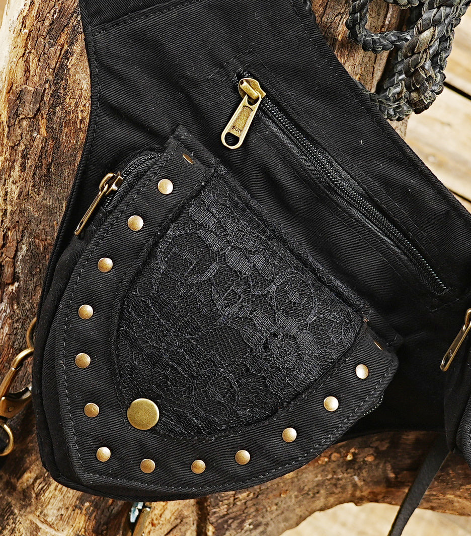 Unisex cotton hip and thigh bag with multi-pocket zippered storage for concerts and travel.