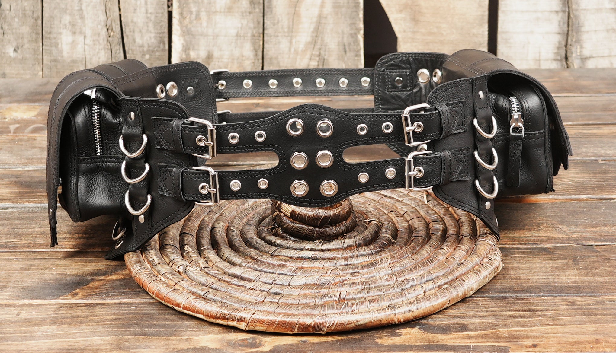 leather belt with metal rings and buckles