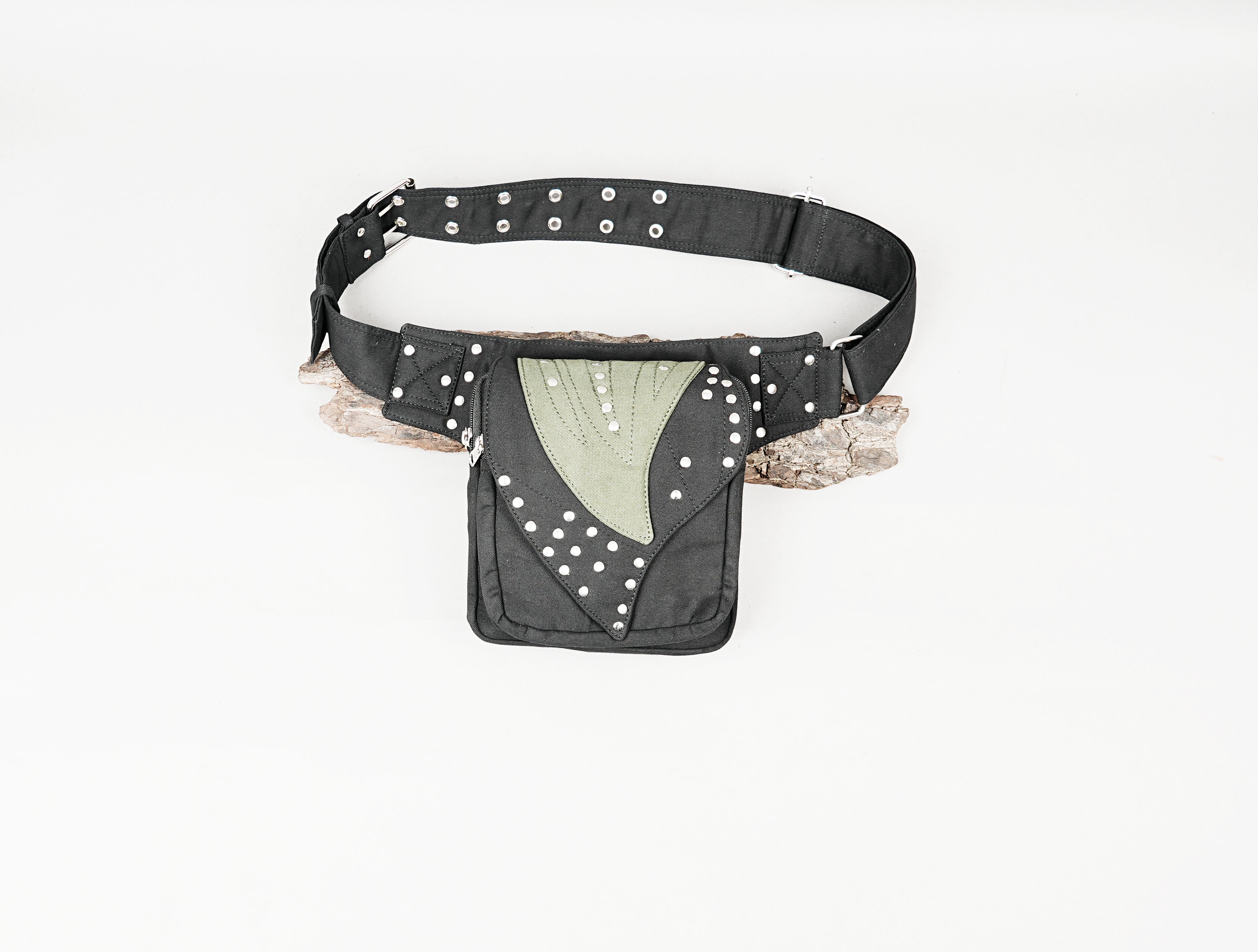 Multi-functional black canvas utility belt for a modern, functional streetwear outfit.