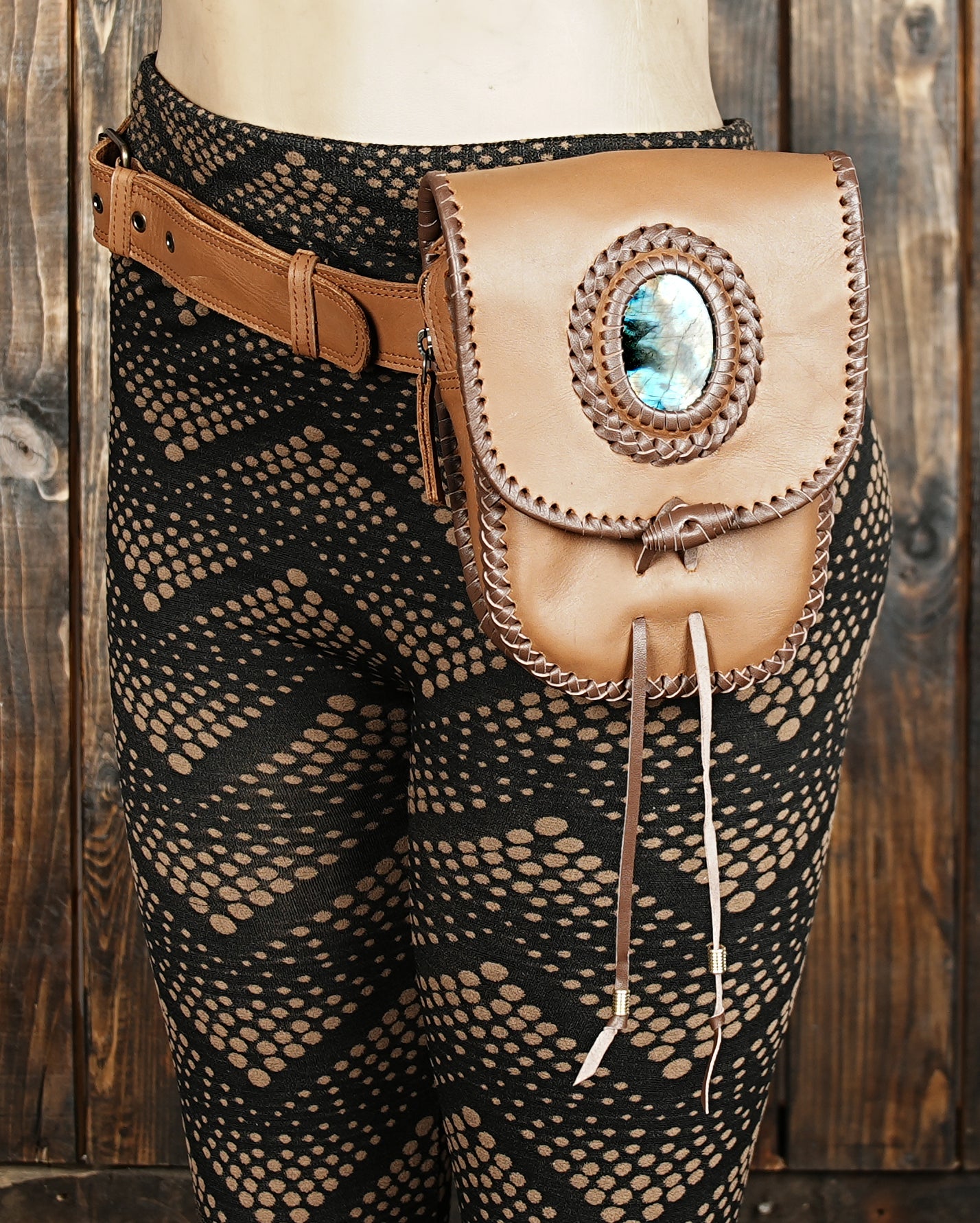 Leather belt bag with hand braided edges and stone accent