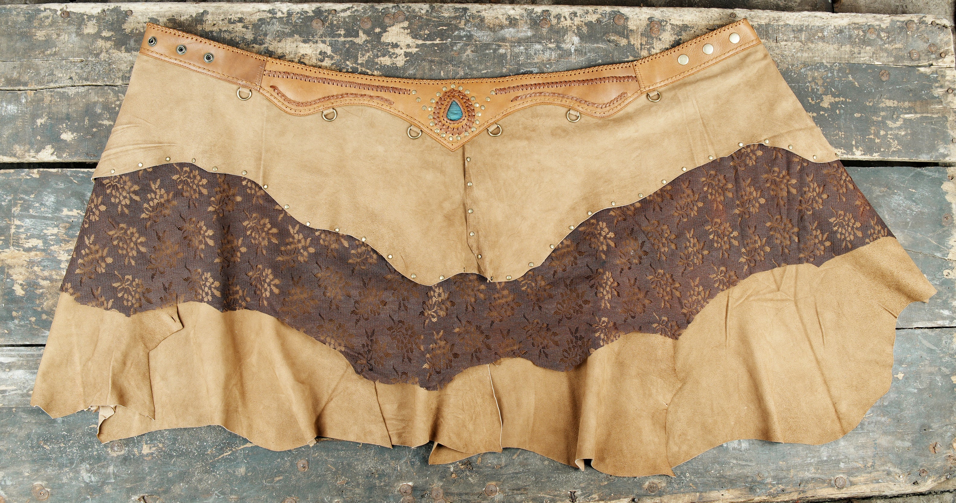 Vintage western leather skirt with lace texture and studded waistband
