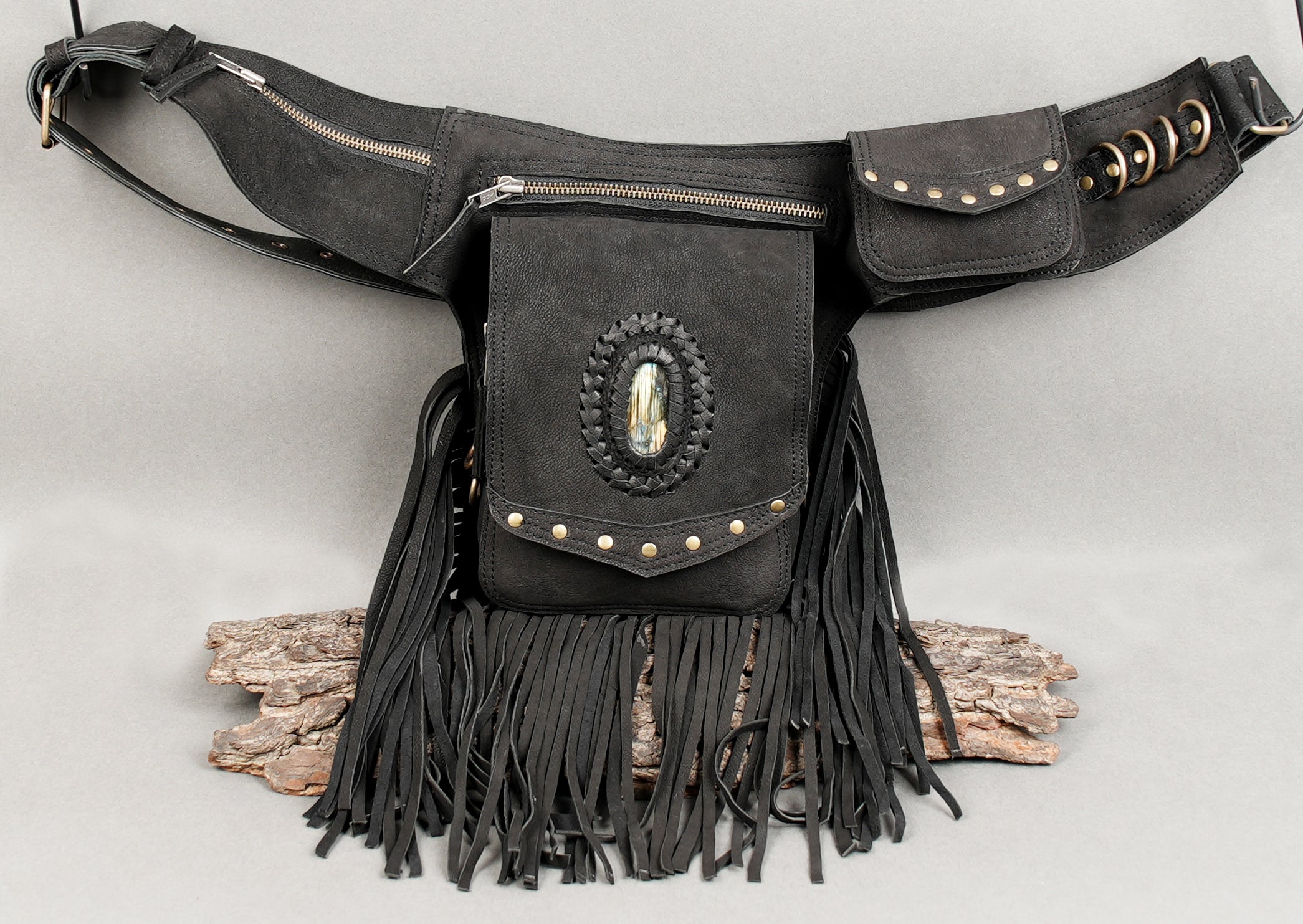 Adjustable black leather waist belt with fringe and snap pouch