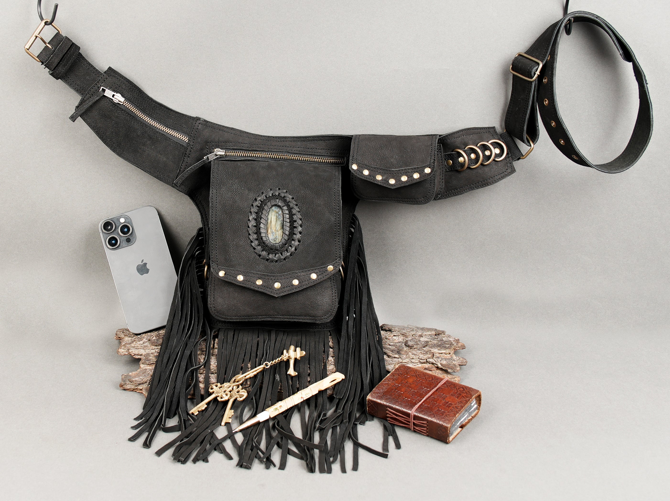 Premium leather waist belt with natural stone accent and tassels