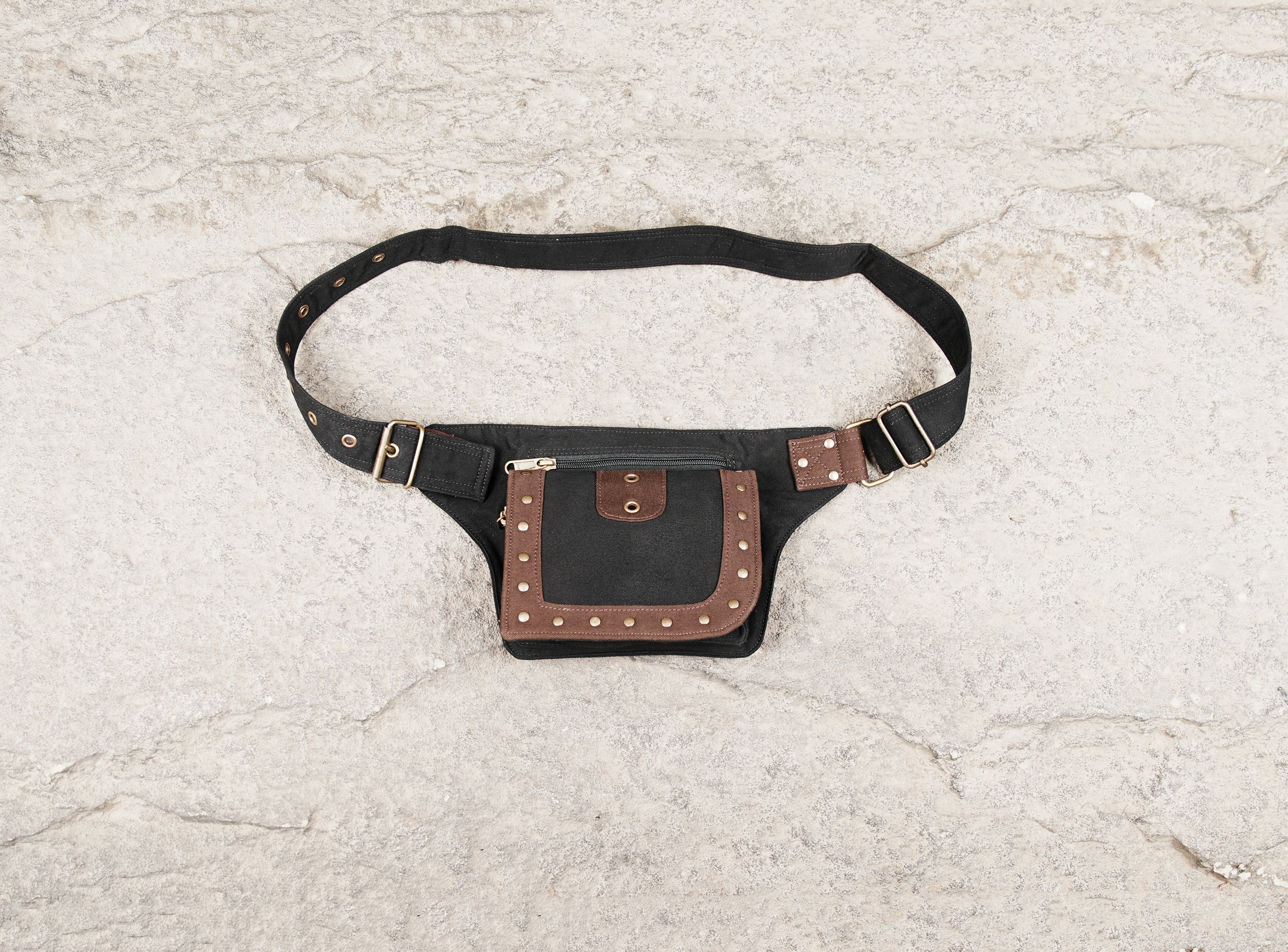 Black cotton waist belt bag with brown trim and zipper pocket