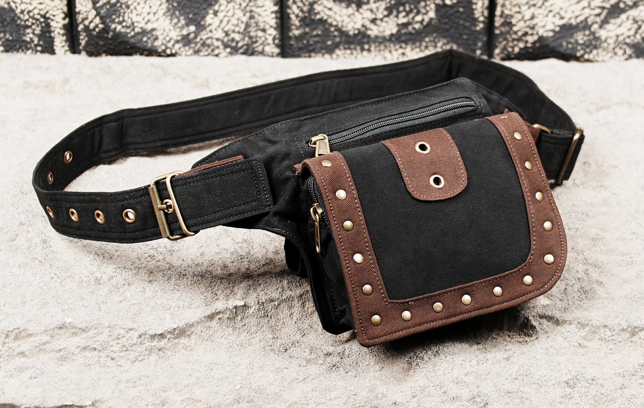 Black festival waist pouch with brass stud accents