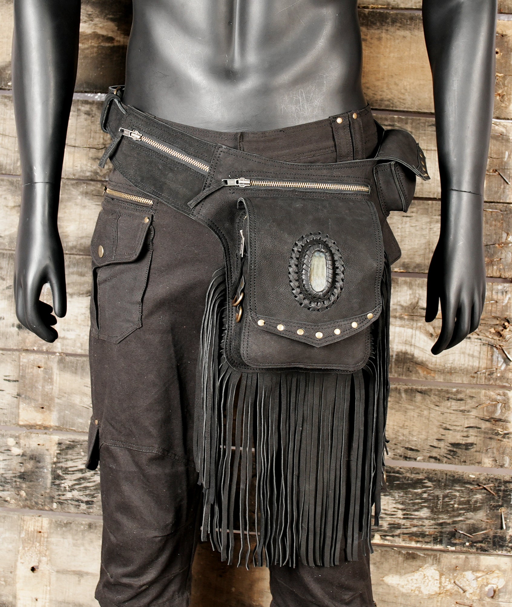 Black leather festival belt with fringe and artisan craftsmanship