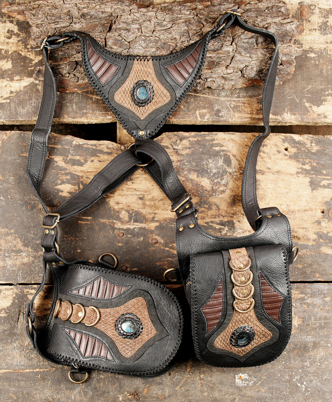 Handcrafted leather chest rig with detailed tribal embossing