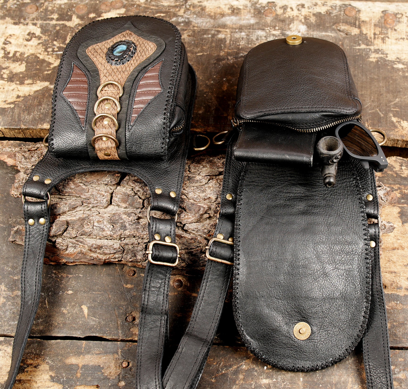 Black leather body holster with adjustable belt straps