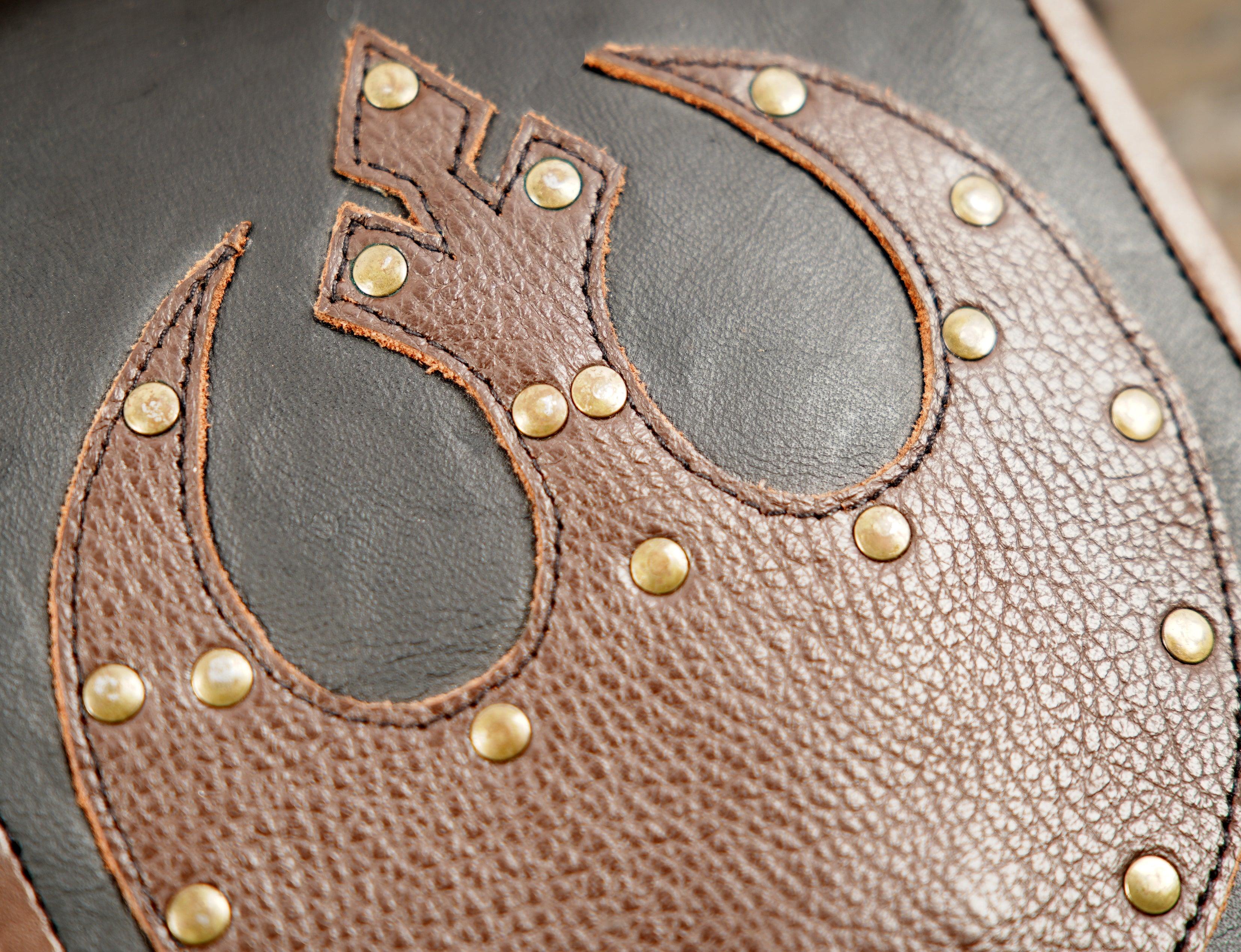Steampunk style leather holster bag with metal rivet detailing