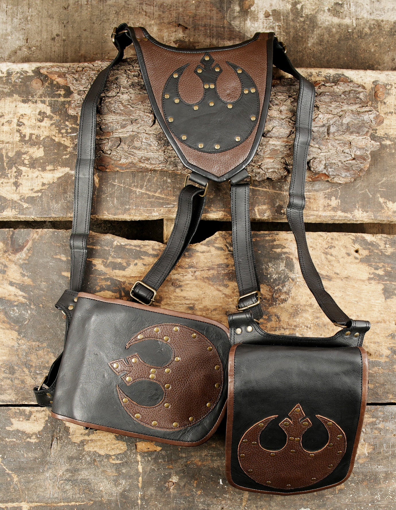 Custom handcrafted leather holster with tribal emblem design