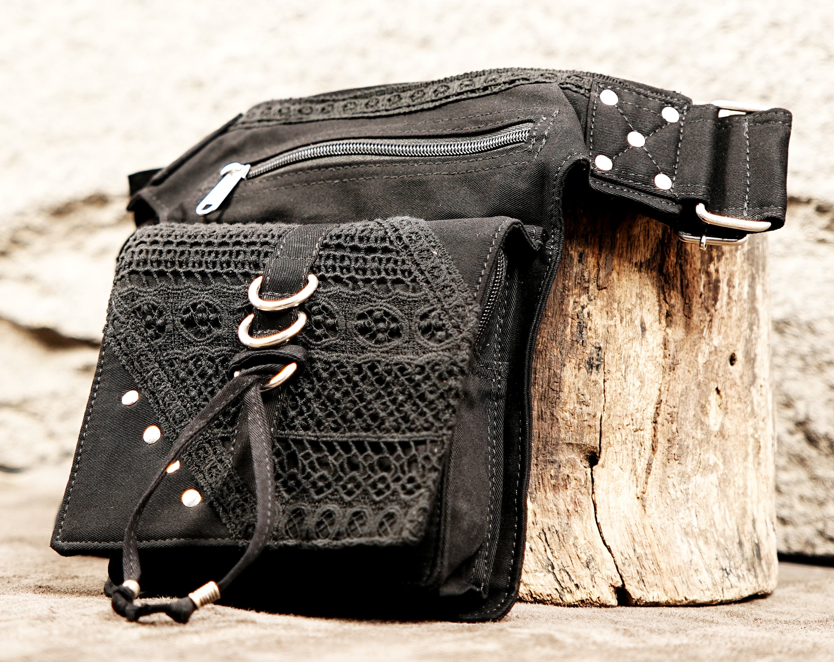 Premium black canvas utility belt pack with a sleek, low-profile and tactical-inspired aesthetic.