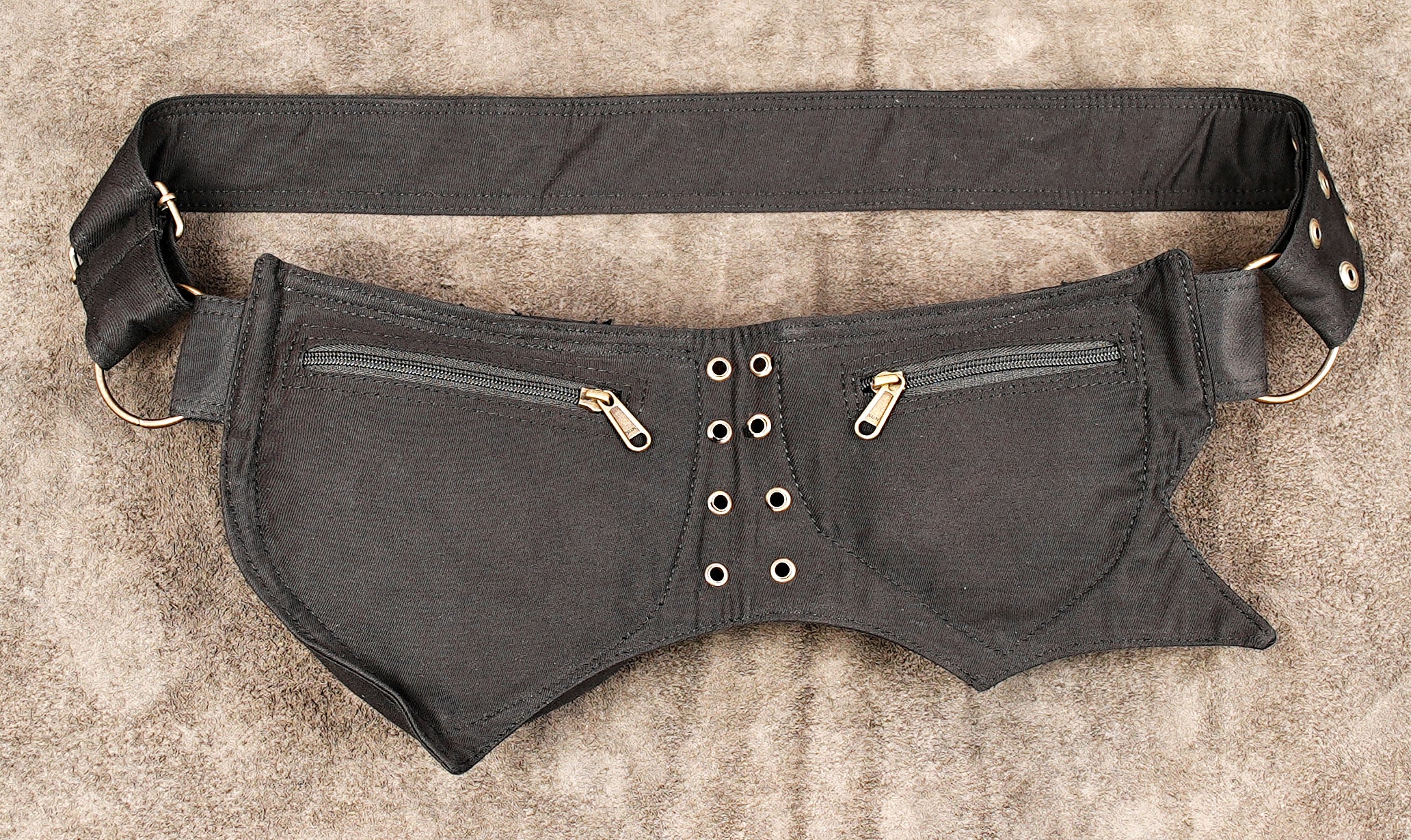 Black canvas warrior belt with studded pockets and gold hardware