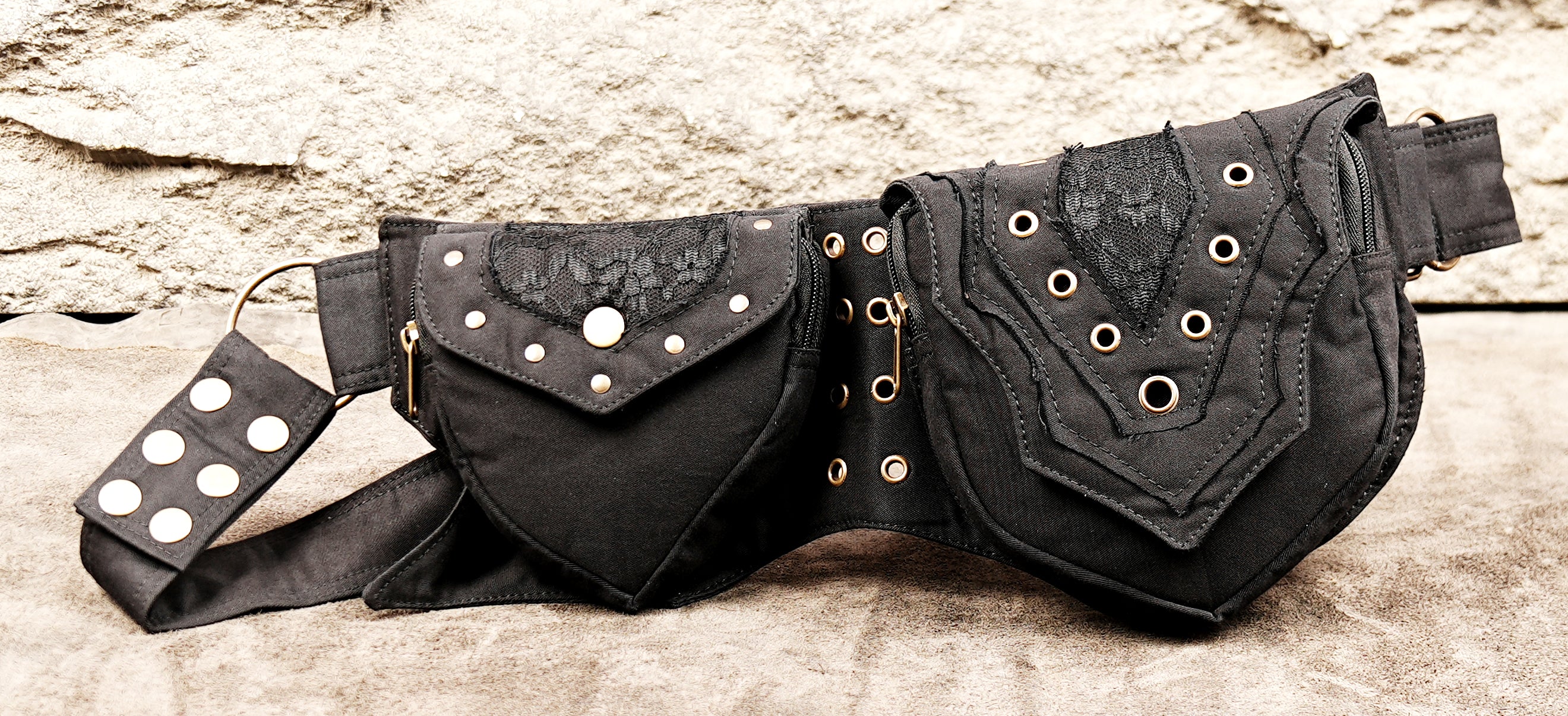 Dark fantasy waist bag with metal grommets and adjustable strap