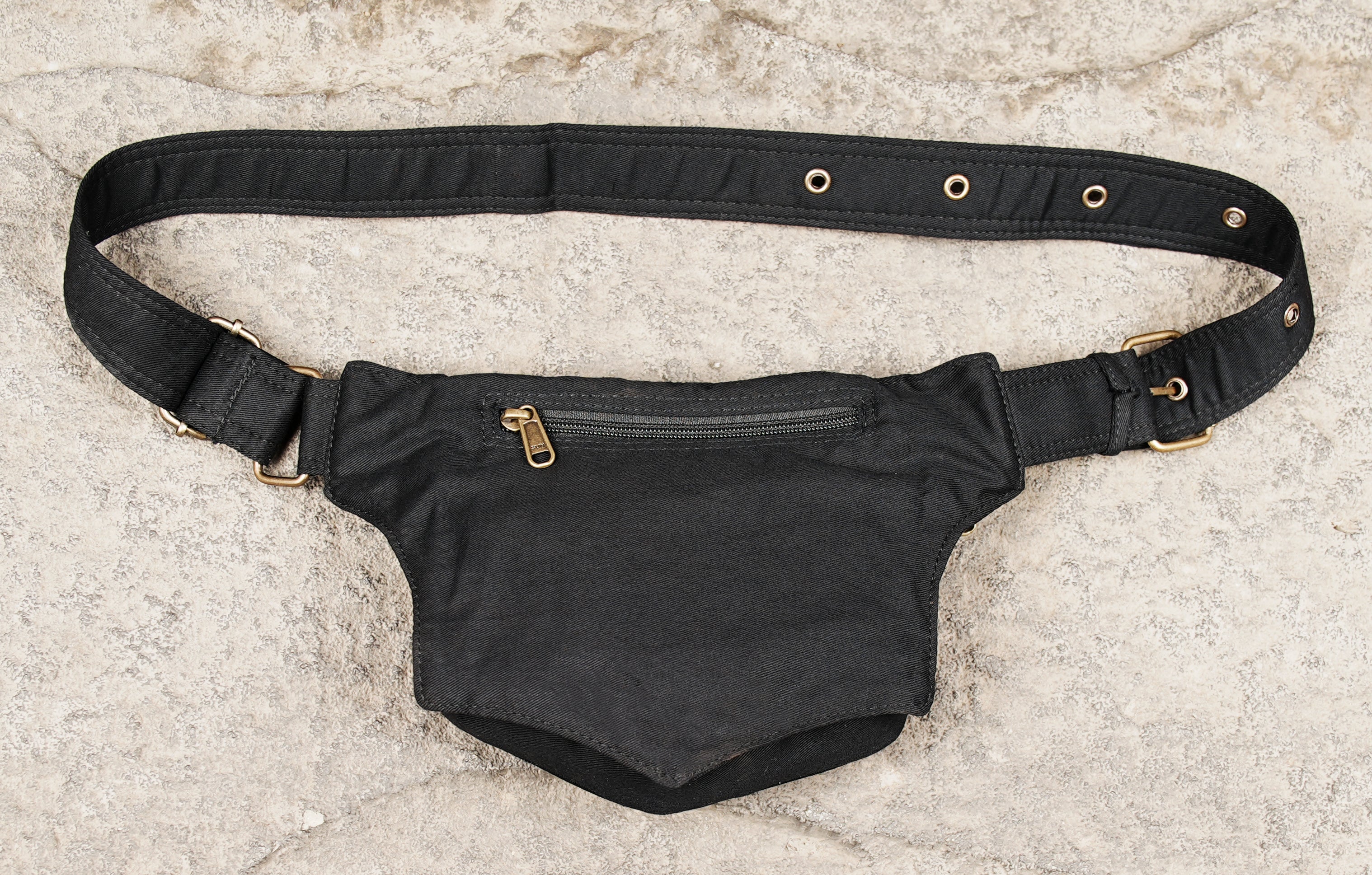 Black canvas belt bag with secure flap closure