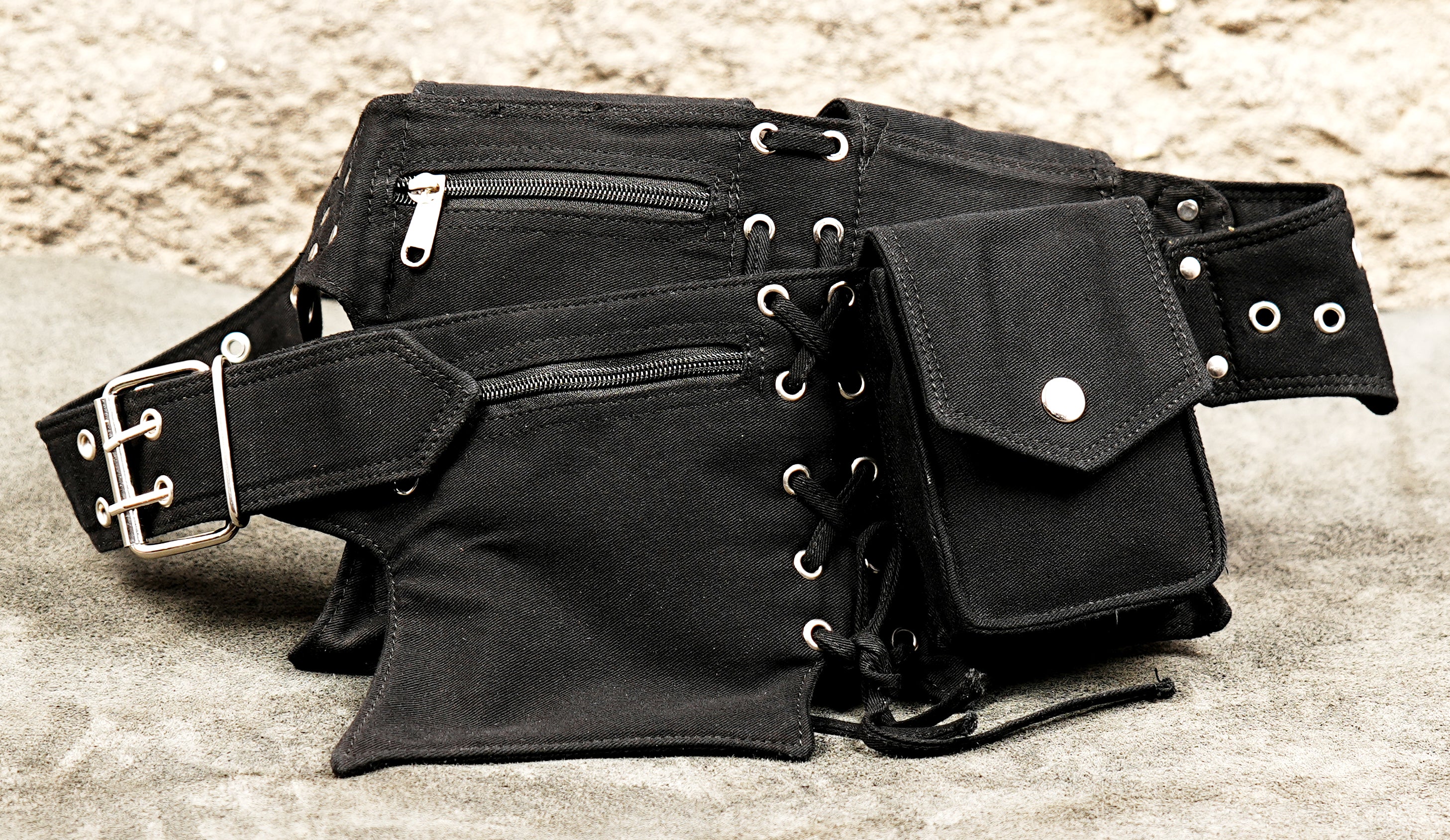 Edgy black studded utility hip belt with steampunk and cyberpunk vibes.