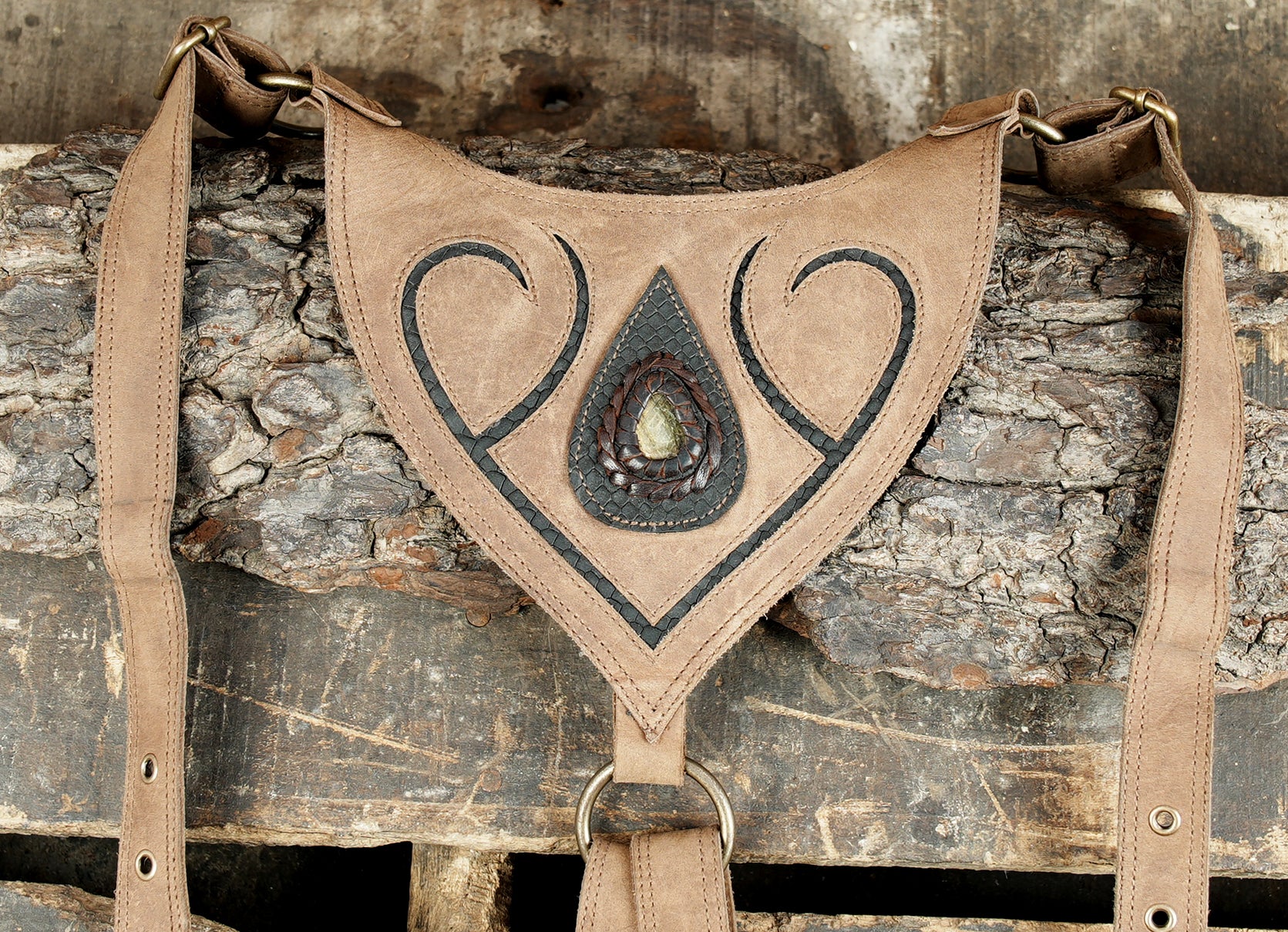 Boho leather holster with dual pockets and rustic detailing