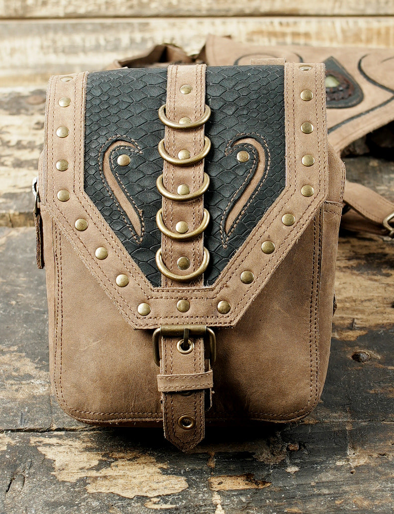 Steampunk inspired leather holster with engraved design