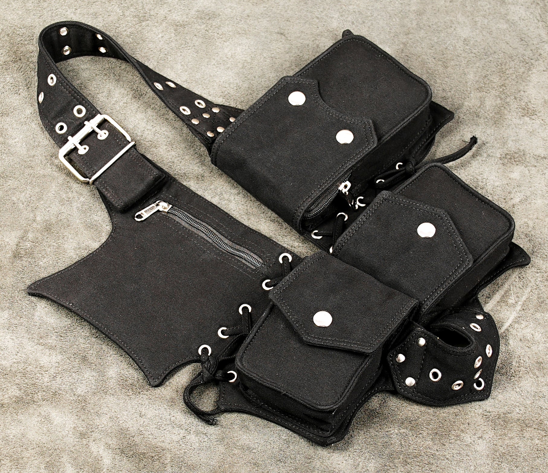 Festival gear black hip bag with pouches, ideal for rave and alternative fashion.