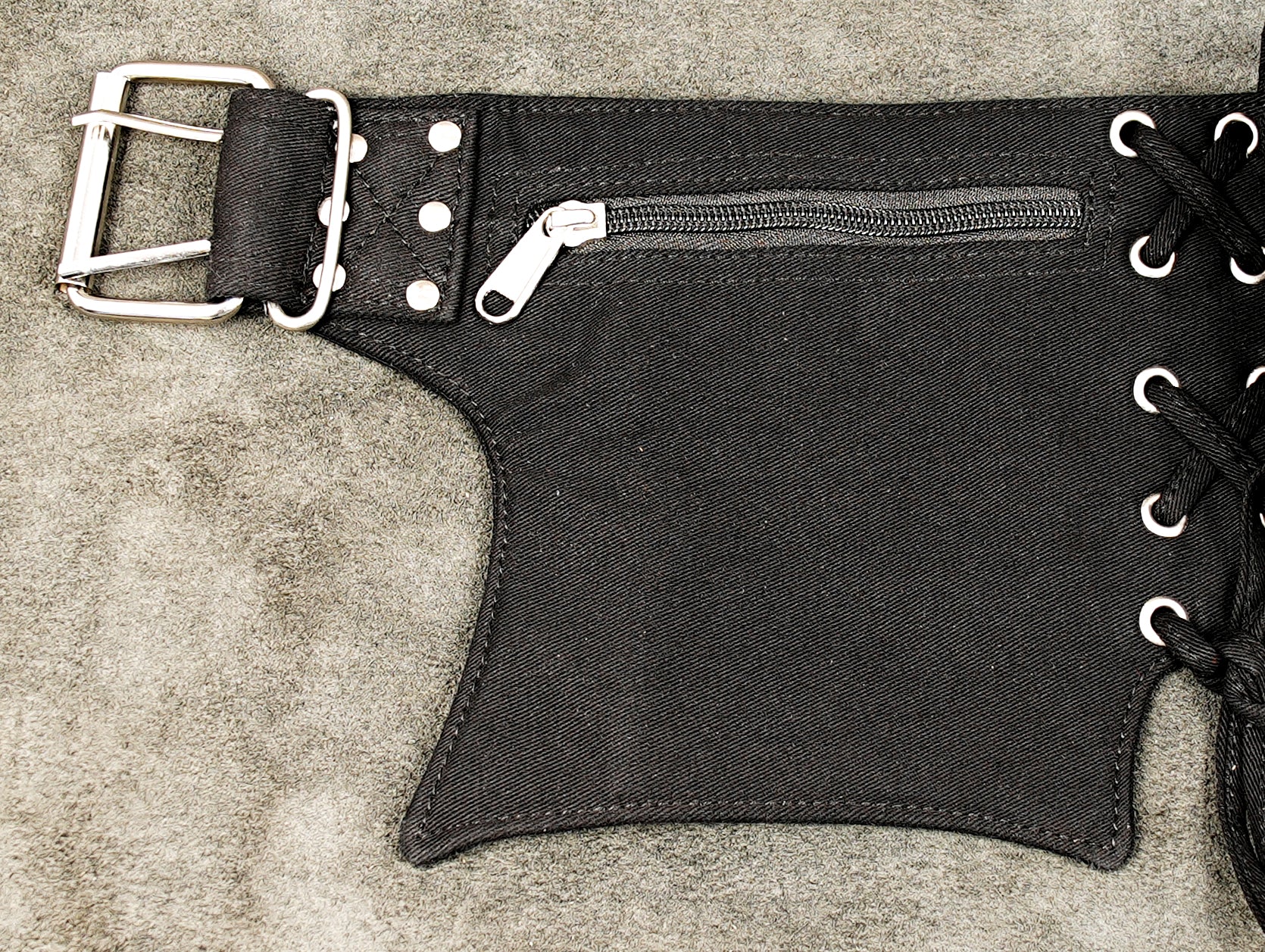 Durable black canvas utility pouch belt with heavy-duty silver hardware.