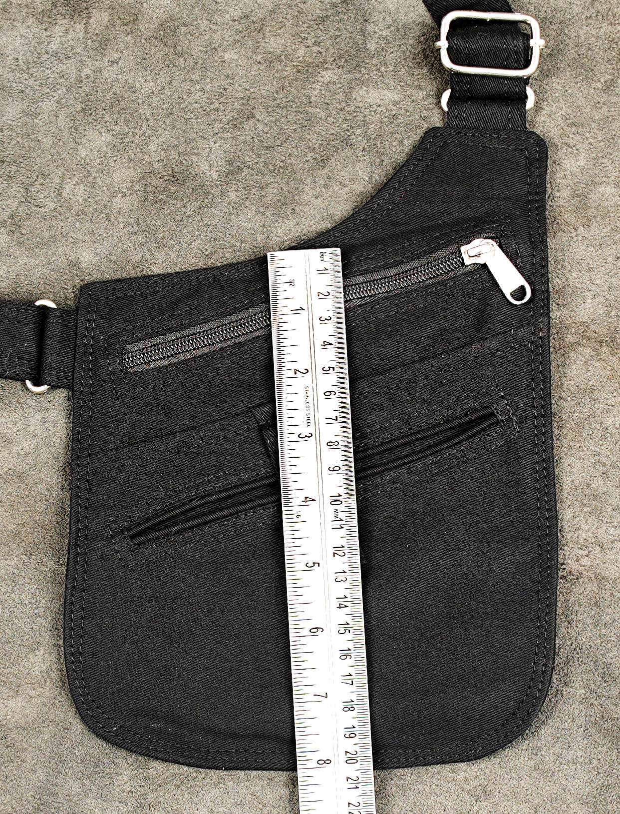 Heavy-duty canvas shoulder bag for outdoor events, travel, and concerts