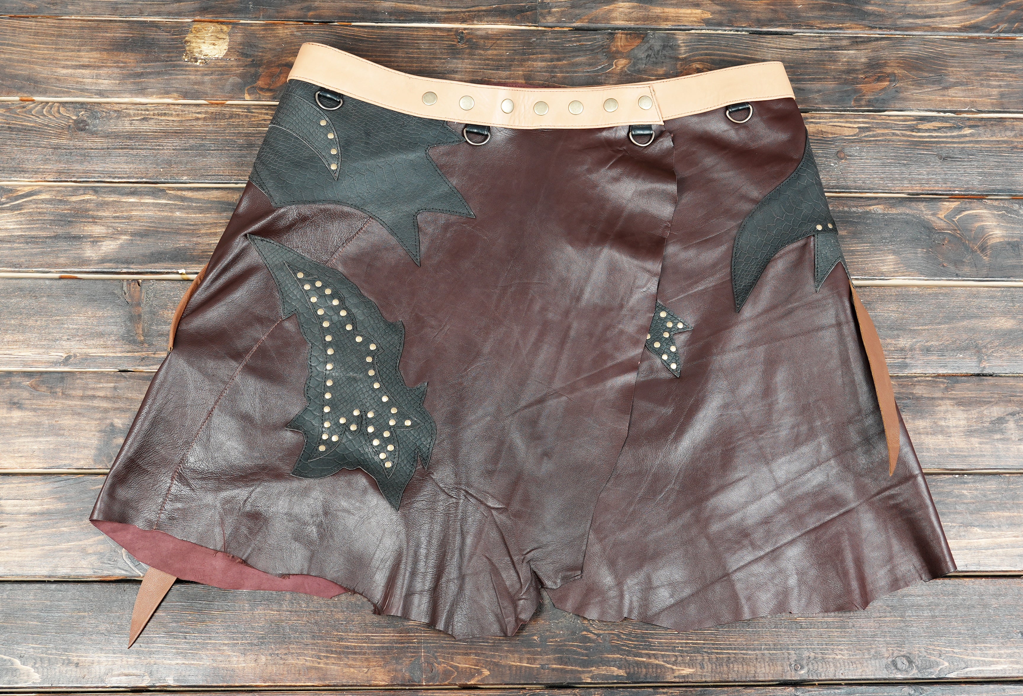 Custom leather skirt with hand finished detailing and durable construction