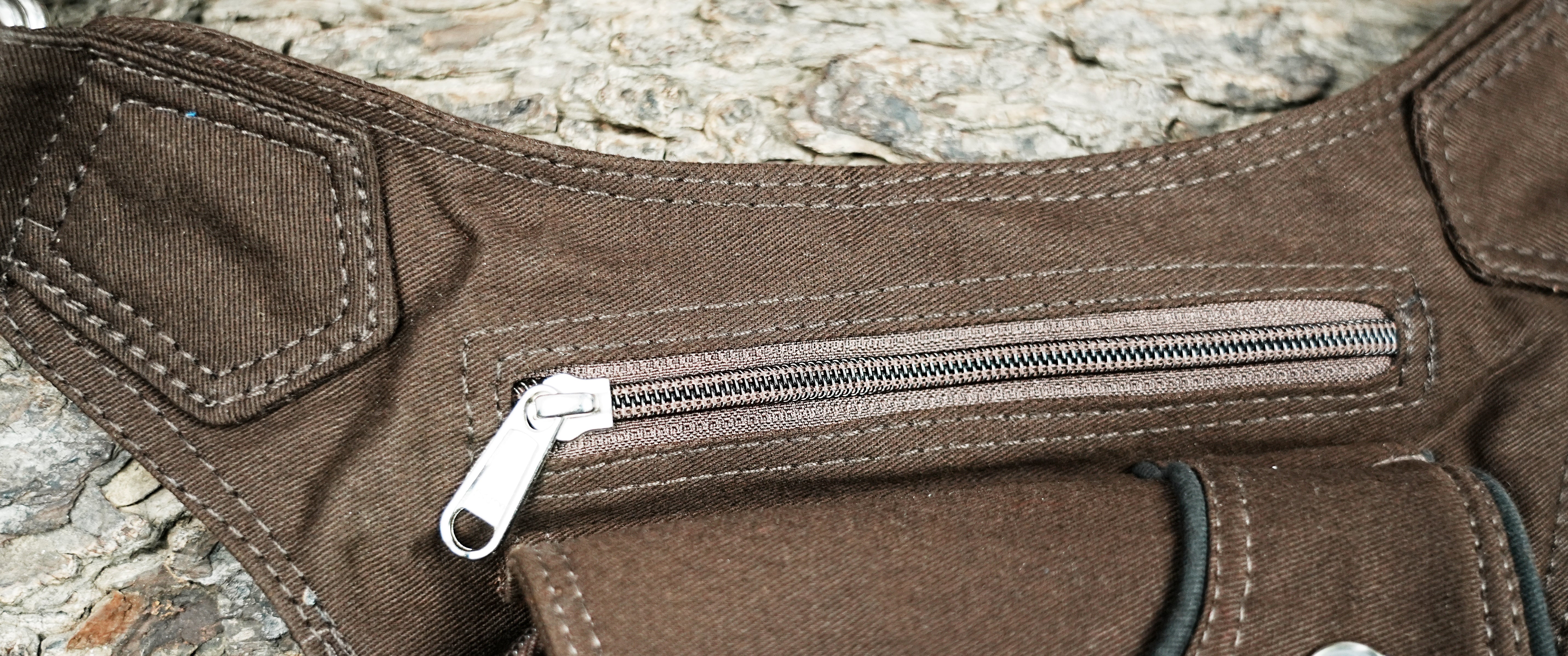 Adjustable brown cotton waist belt to thigh strap utility pack