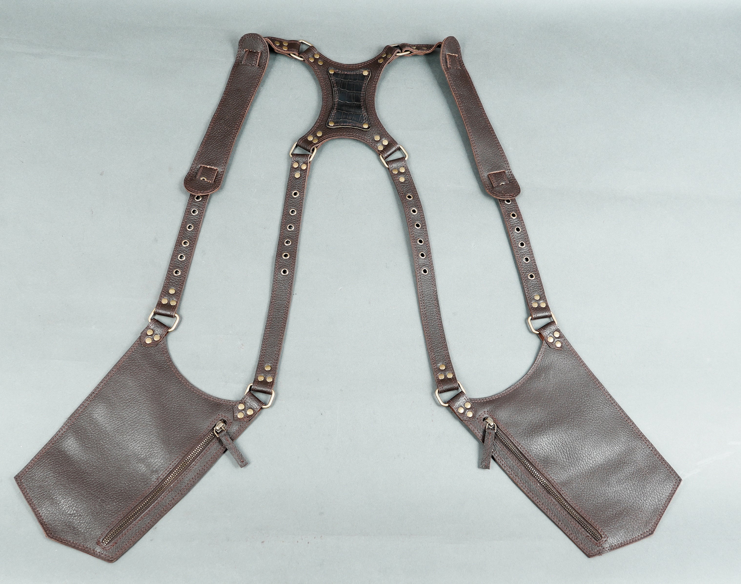 Outdoor leather shoulder holster for multipurpose use