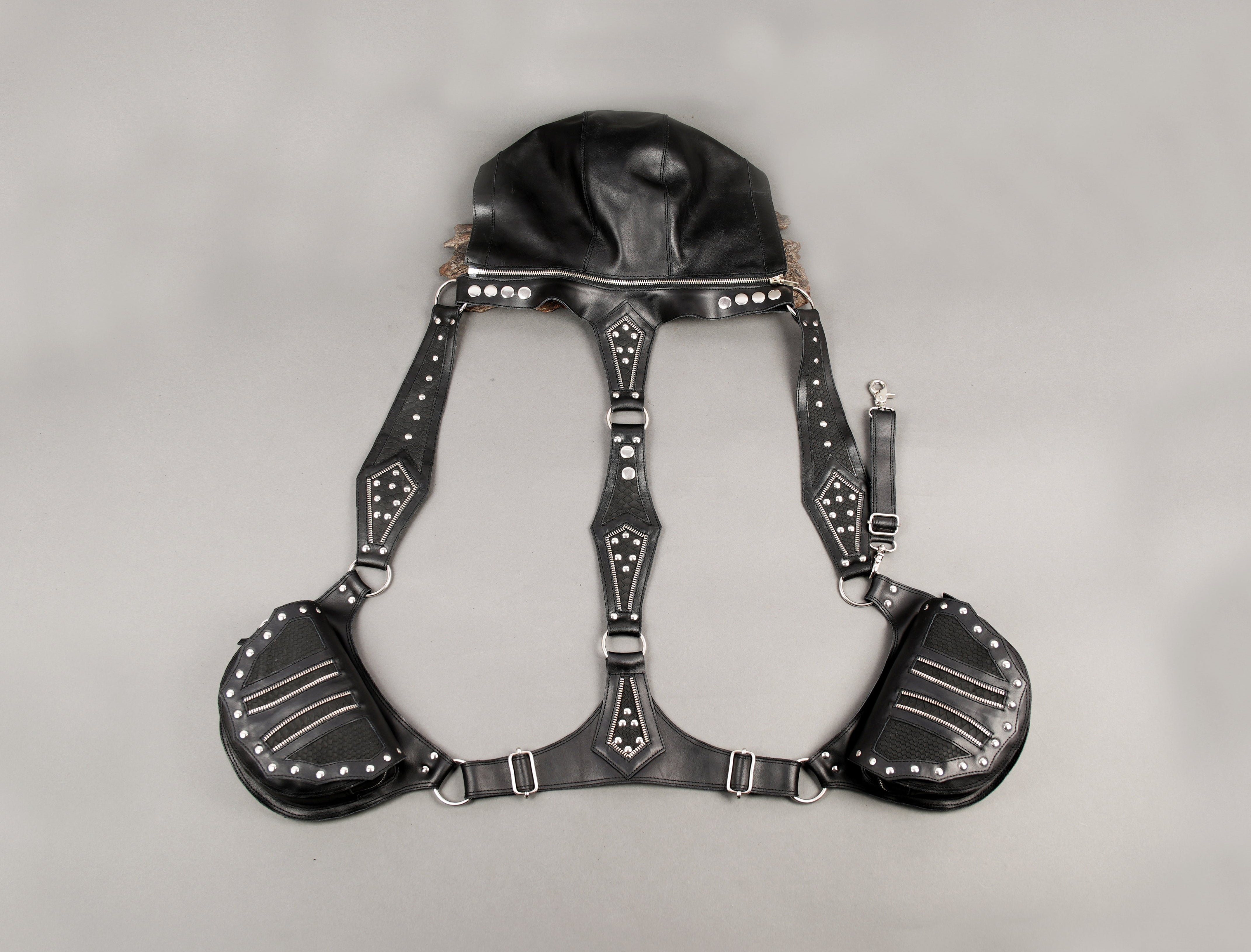 Black leather dual holster bag with studded detailing