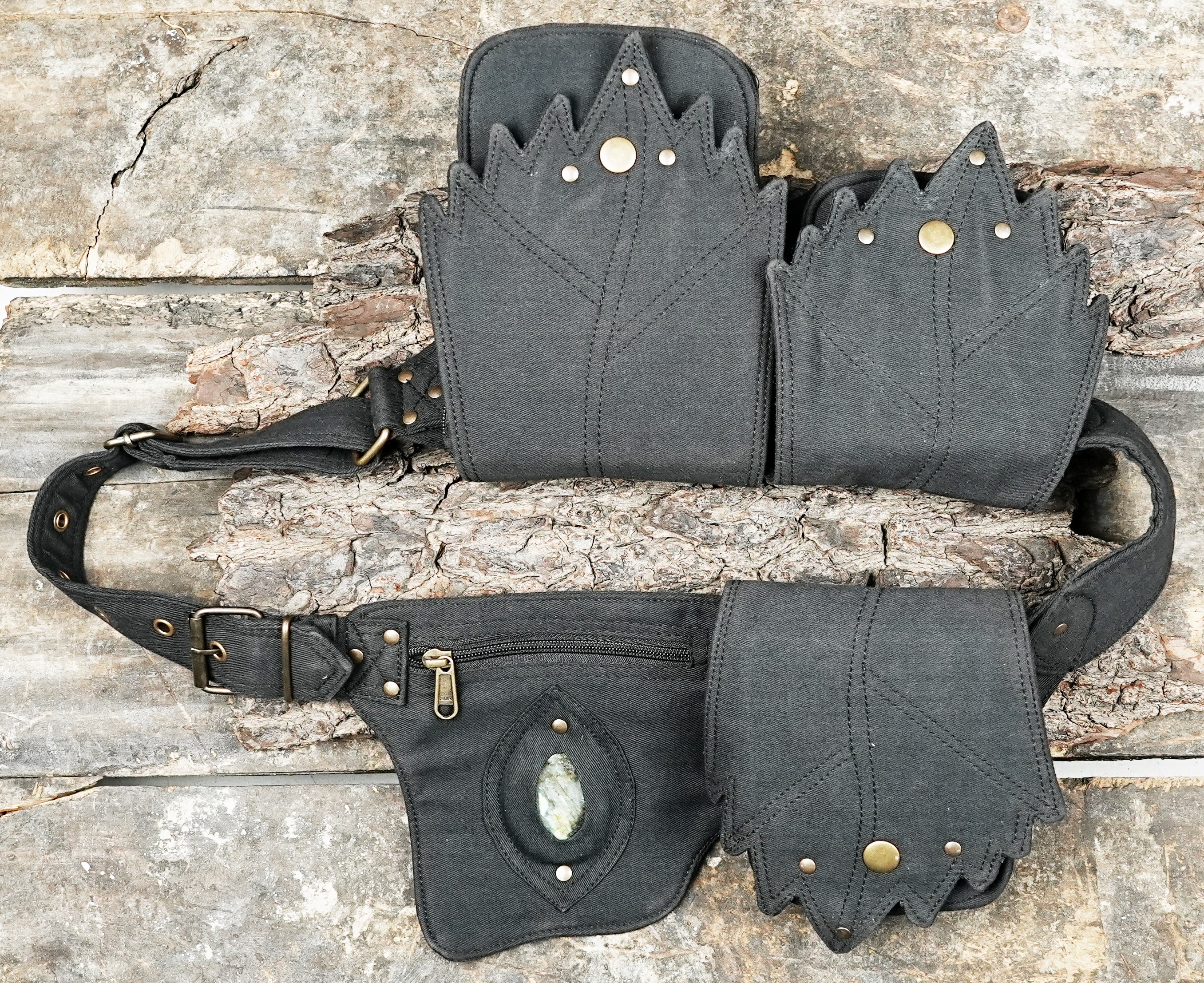 Multi-compartment black cotton utility pouch with gemstone feature