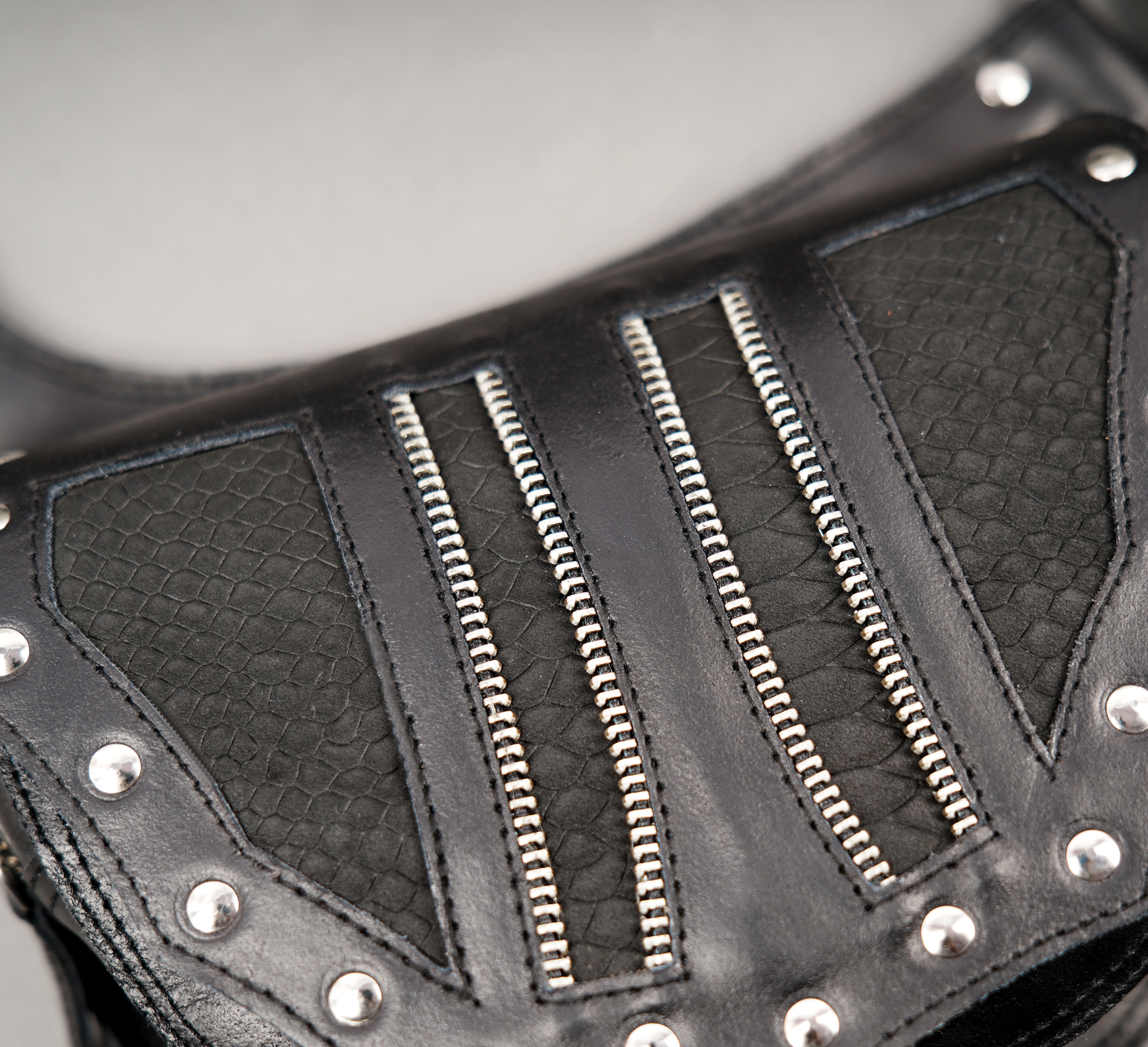 Adjustable leather shoulder harness with two utility bags