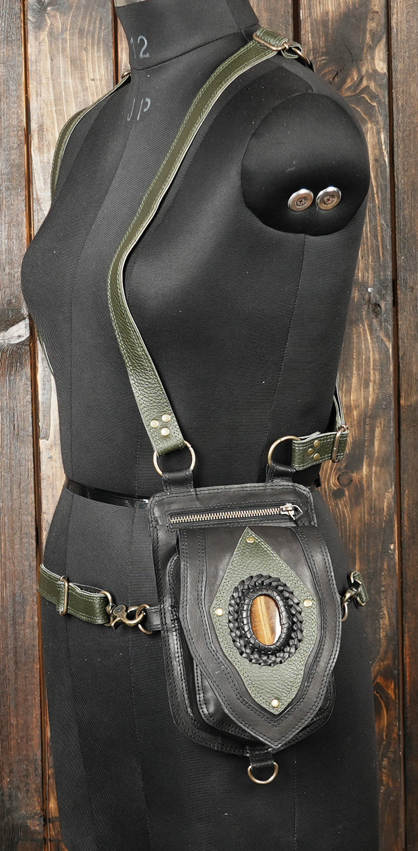 Artisan shoulder holster with decorative braided stone centerpiece