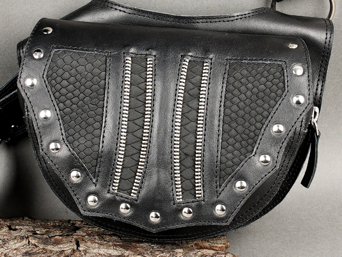 Black festival holster bag with zippers and metal studs