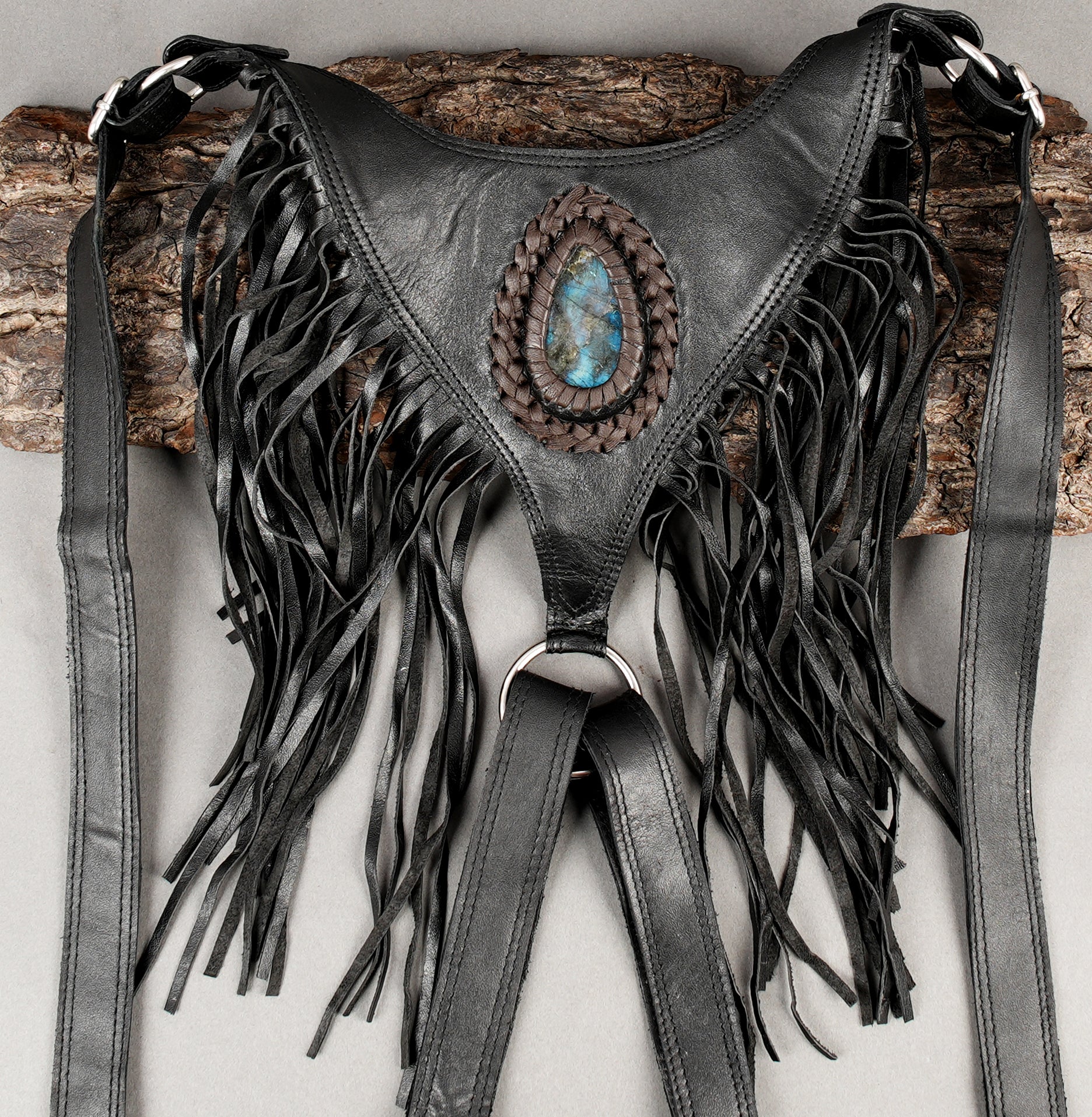 Handcrafted black leather holster with teardrop gemstone accents