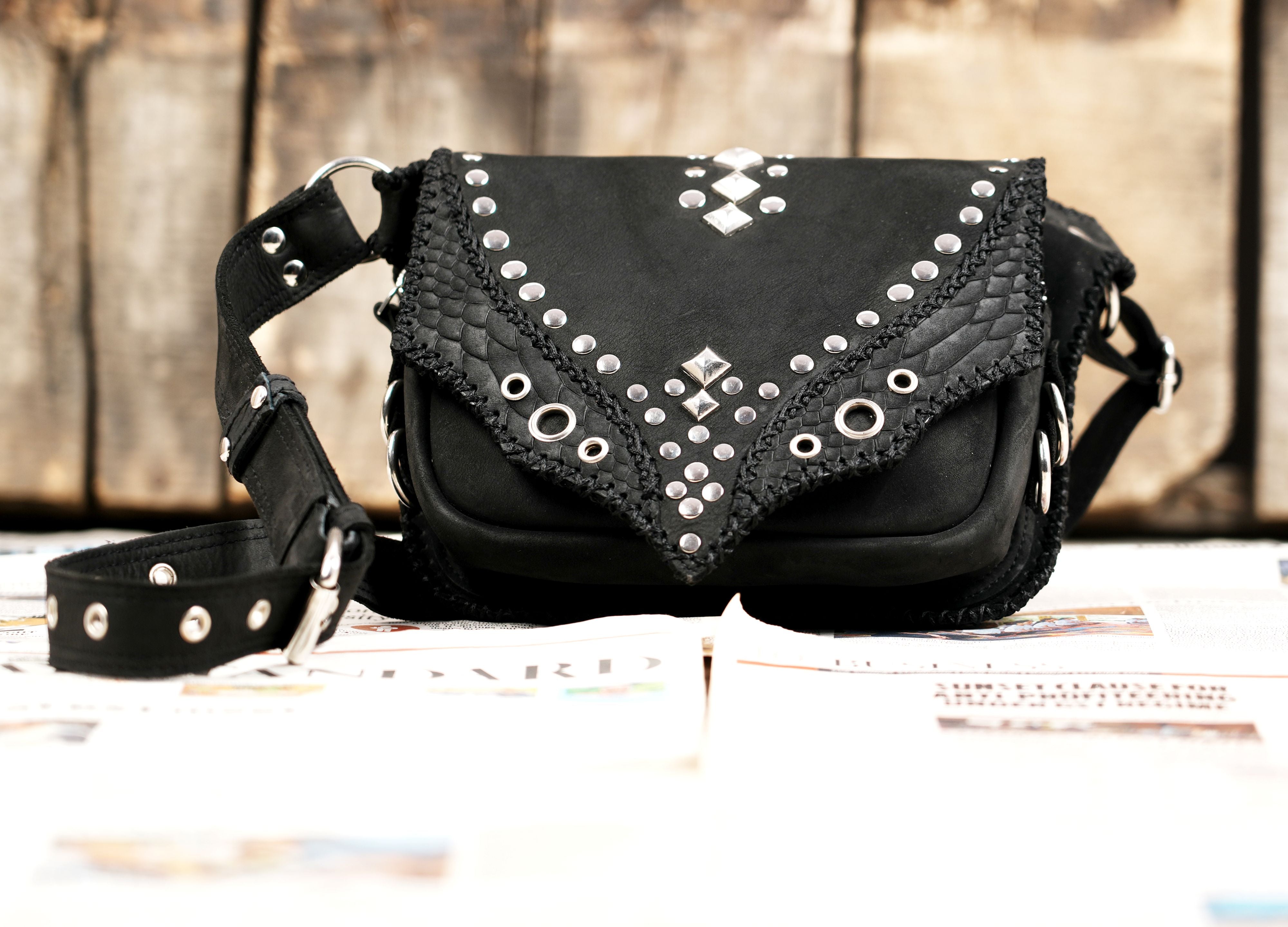 Fashion leather belt bag with decorative flap